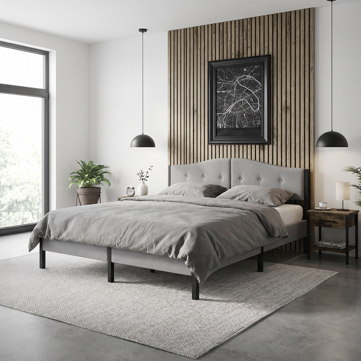 Bedroom with gray bed, wooden paneling, and plants in the room.