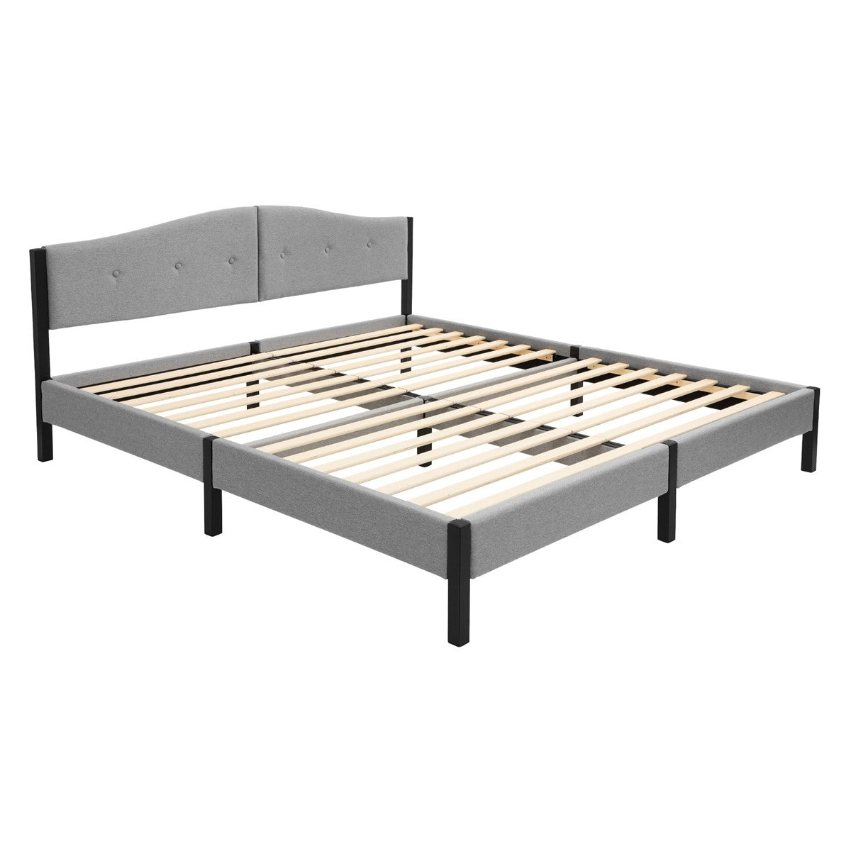Ein Bett mit grauem Kopfteil und Holzlattenrost.