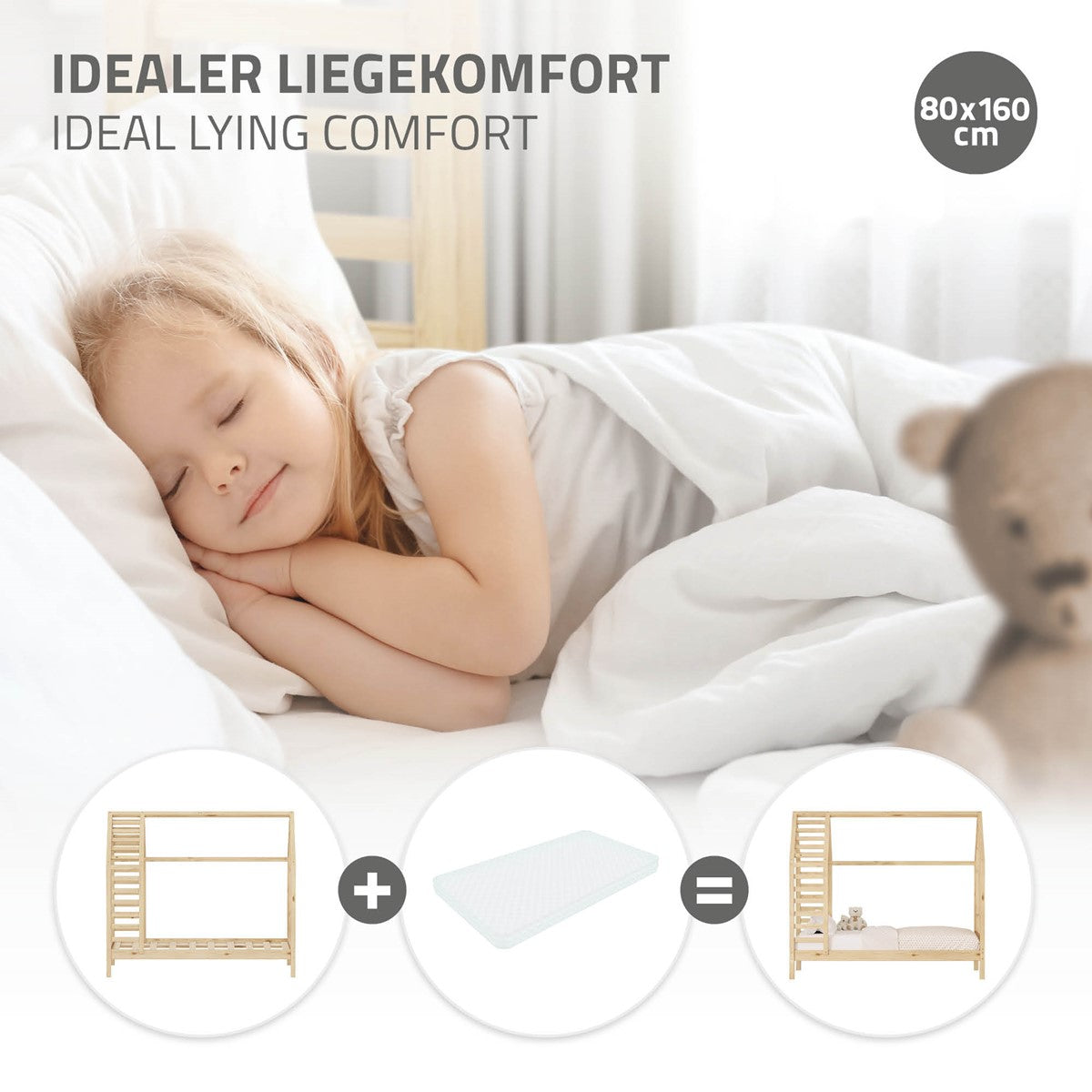 Schlafendes Kind im Bett, umgeben von einer Matratze und einer Decke in einem hellen Raum.