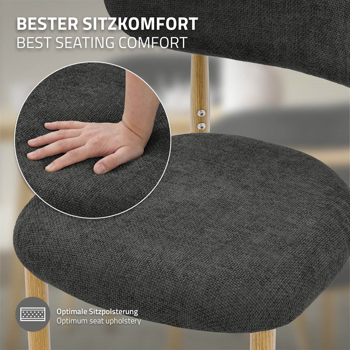 Nahaufnahme eines dunkelgrauen Stuhlpolsters mit einer Hand, die darauf drückt; daneben steht „Bester Sitzkomfort“.