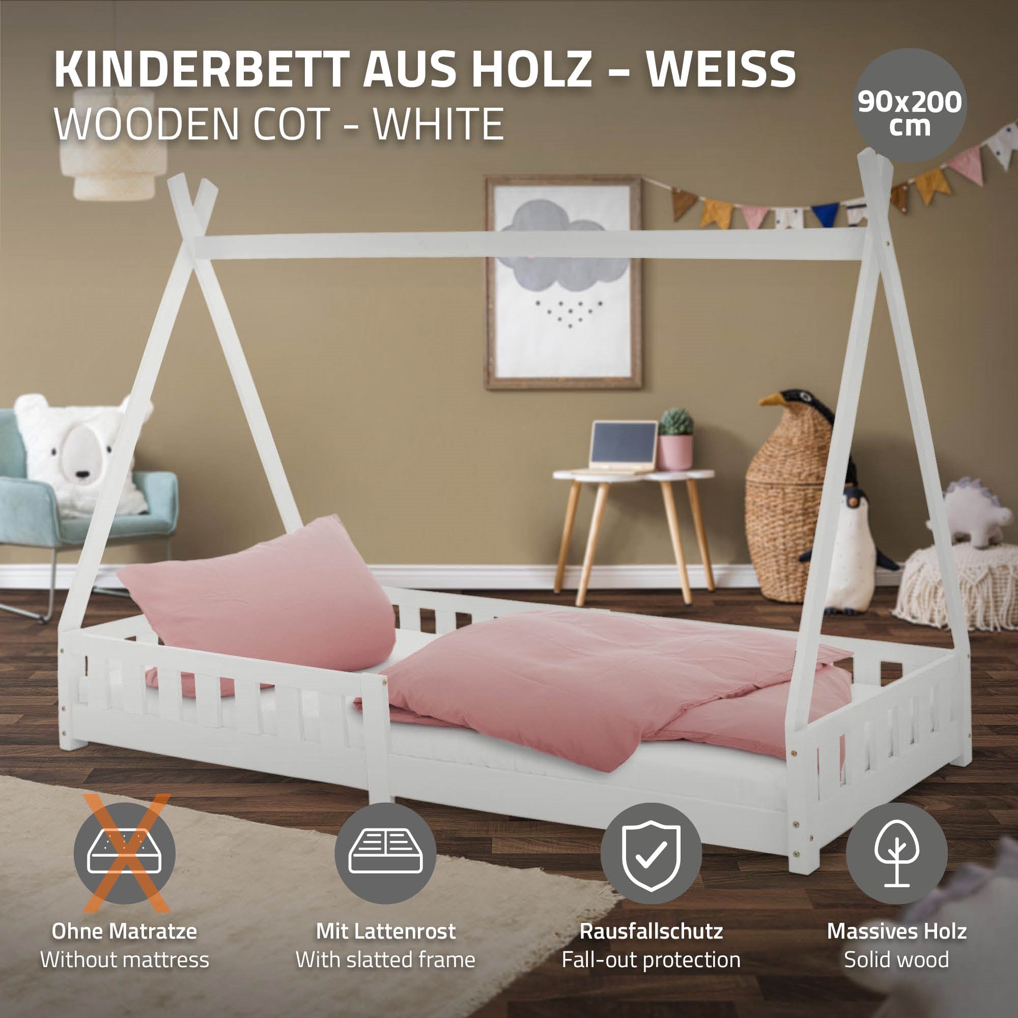 Weißes Holz-Kinderbett mit zwei Kissen und Rausfallschutz, ohne Matratze.