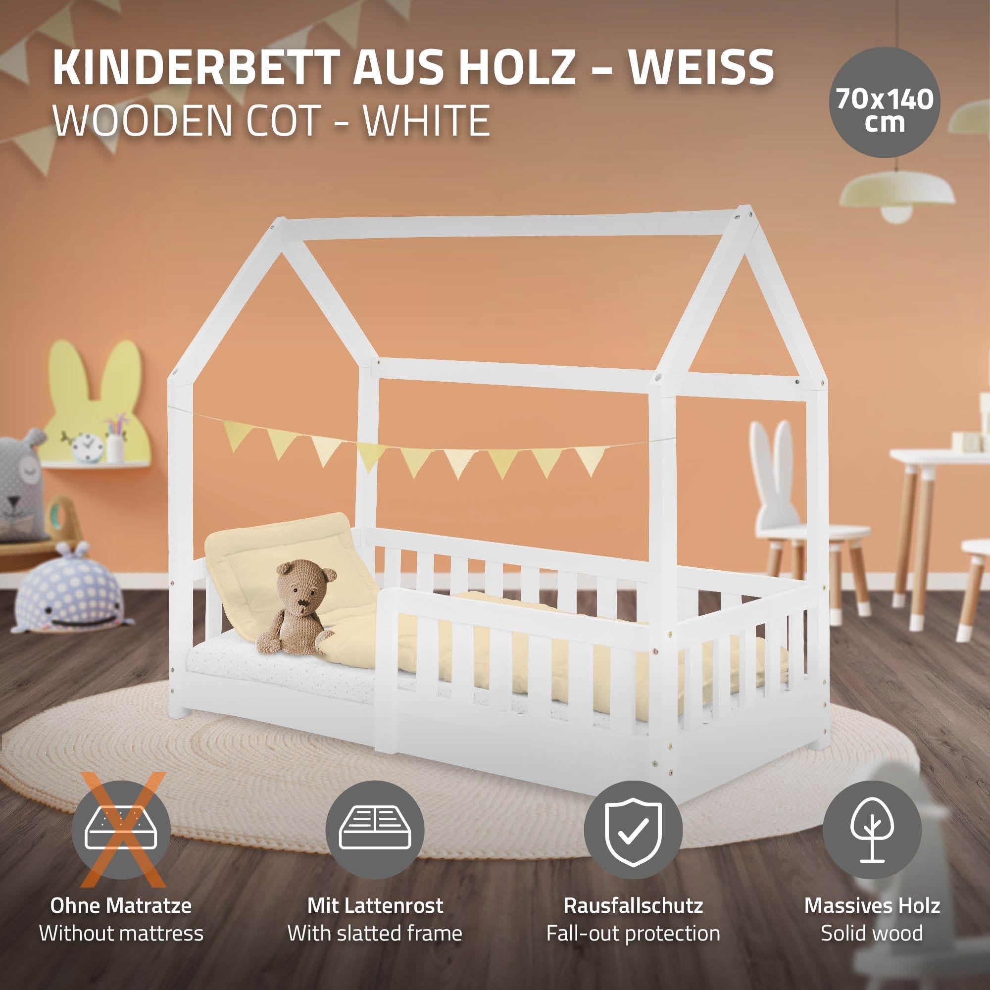 Holz-Kinderbett in weiß ohne Matratze und mit Rausfallschutz.