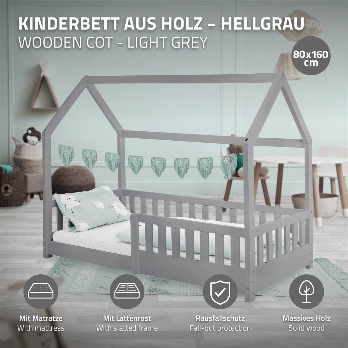 Light grey wooden children's bed with mattress and fall guard.