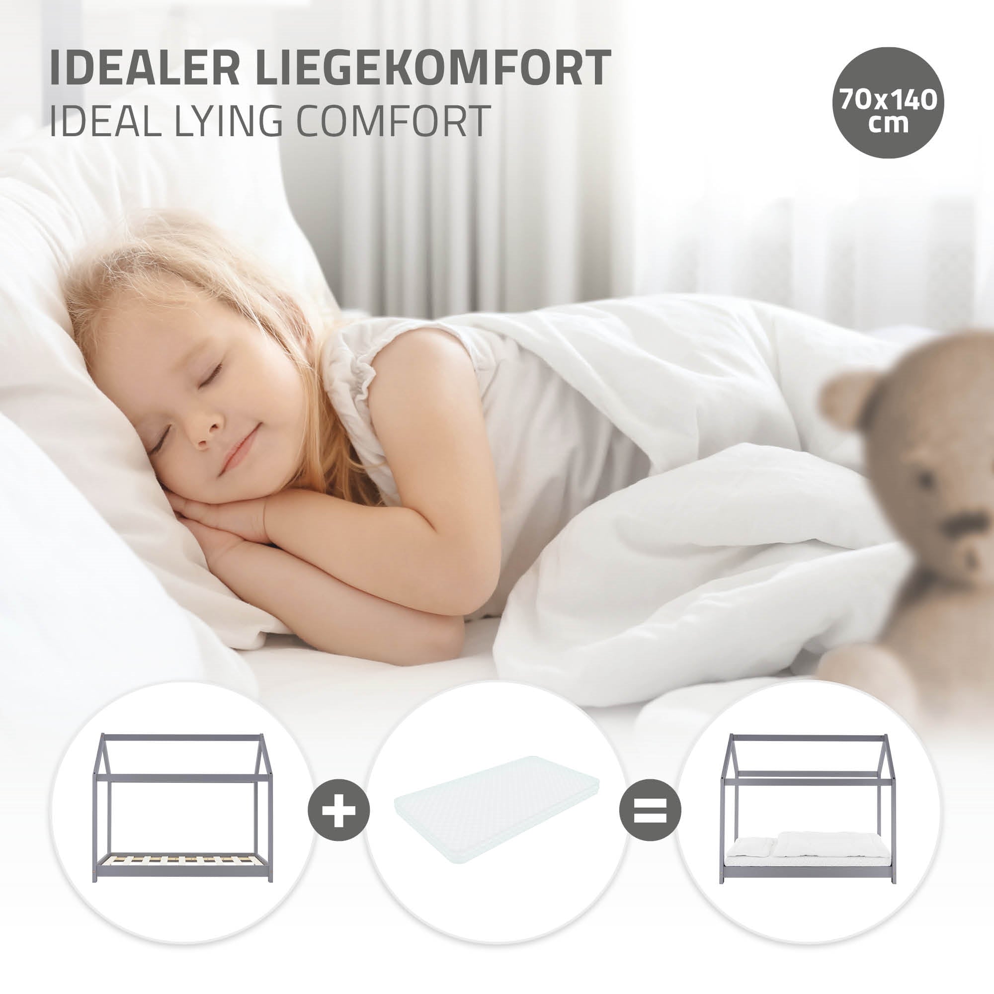 Schlafendes Kind auf einer Matratze, umgeben von einem Teddy und Bettwäsche.