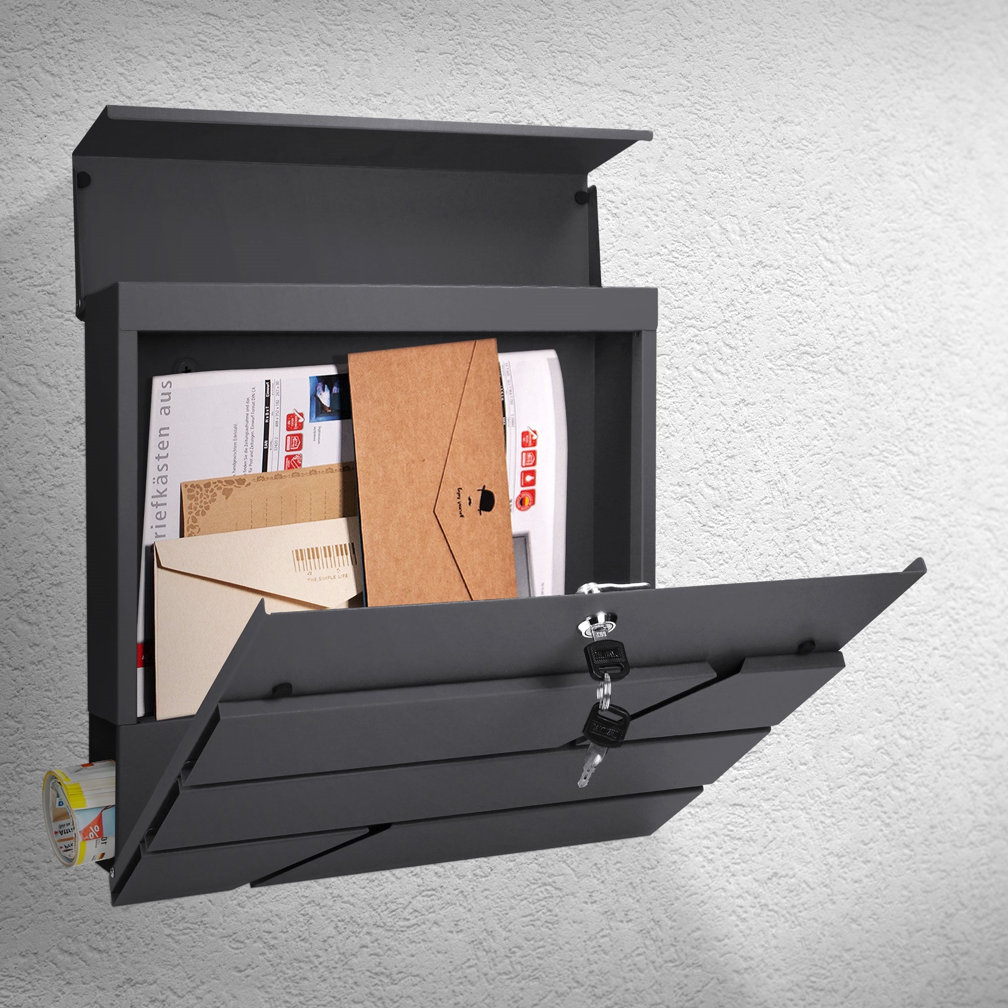 Gray mailbox on a wall, opened with letters inside.