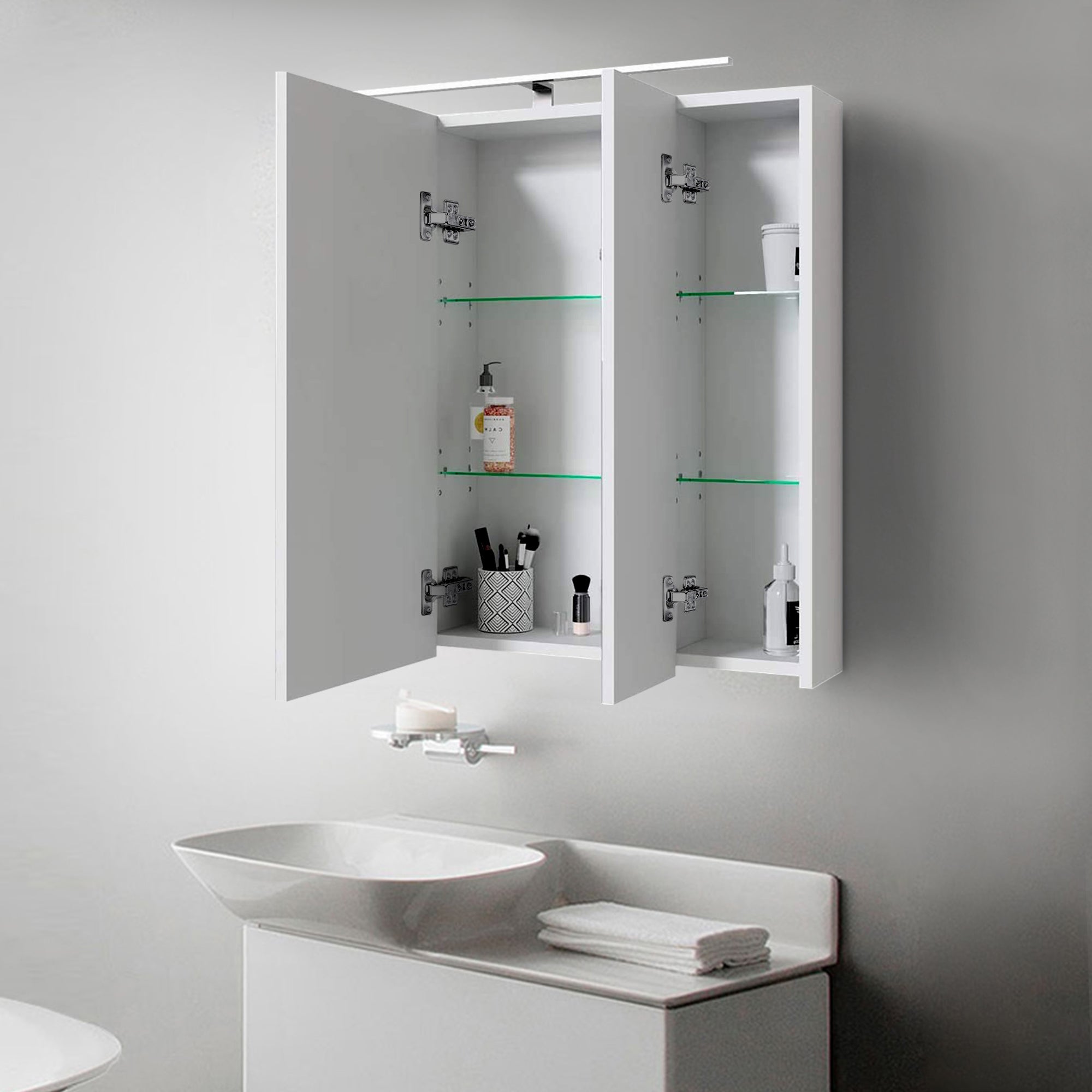 Open wall cabinet with two doors, interior view with shelves and lighting.