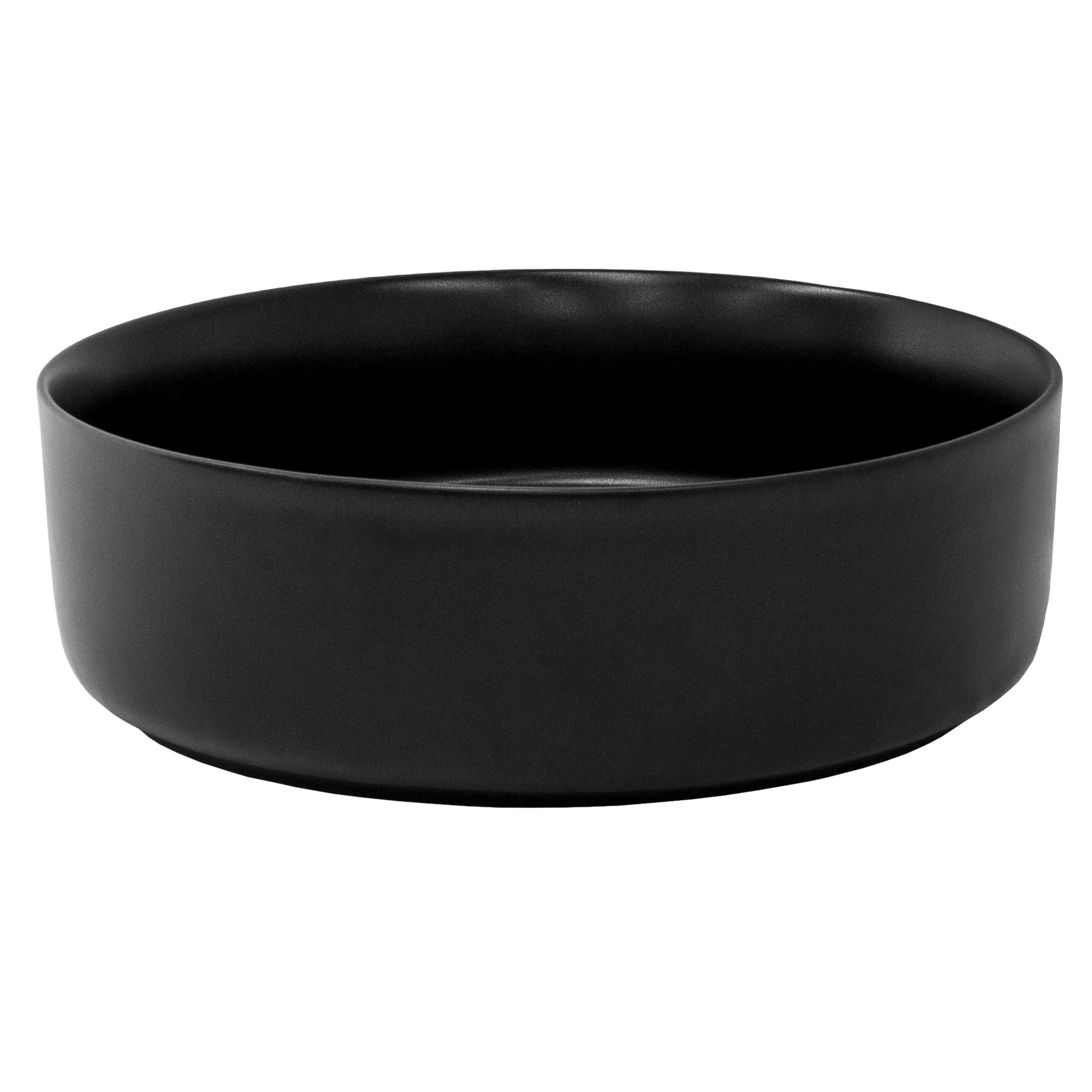 Black round bowl on a light wood background.