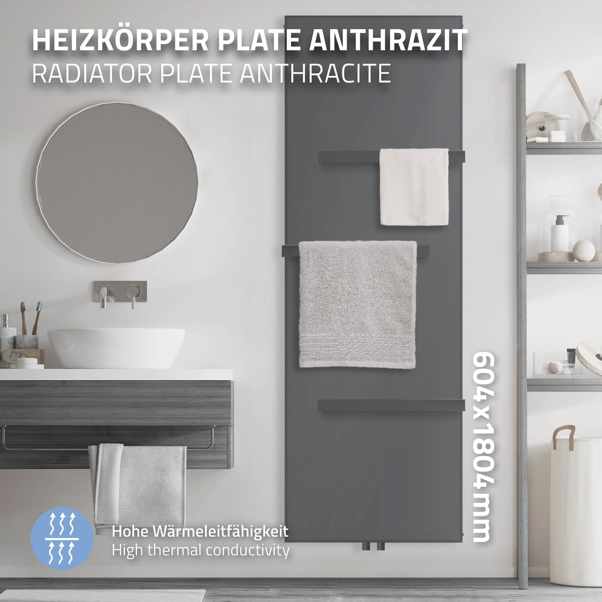 Grafit színű radiátor két törölközővel, fürdőszobai környezetben.