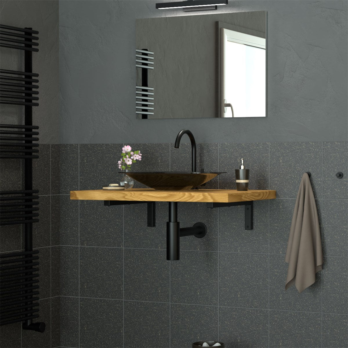 Wooden countertop with a washbasin in a modern bathroom.