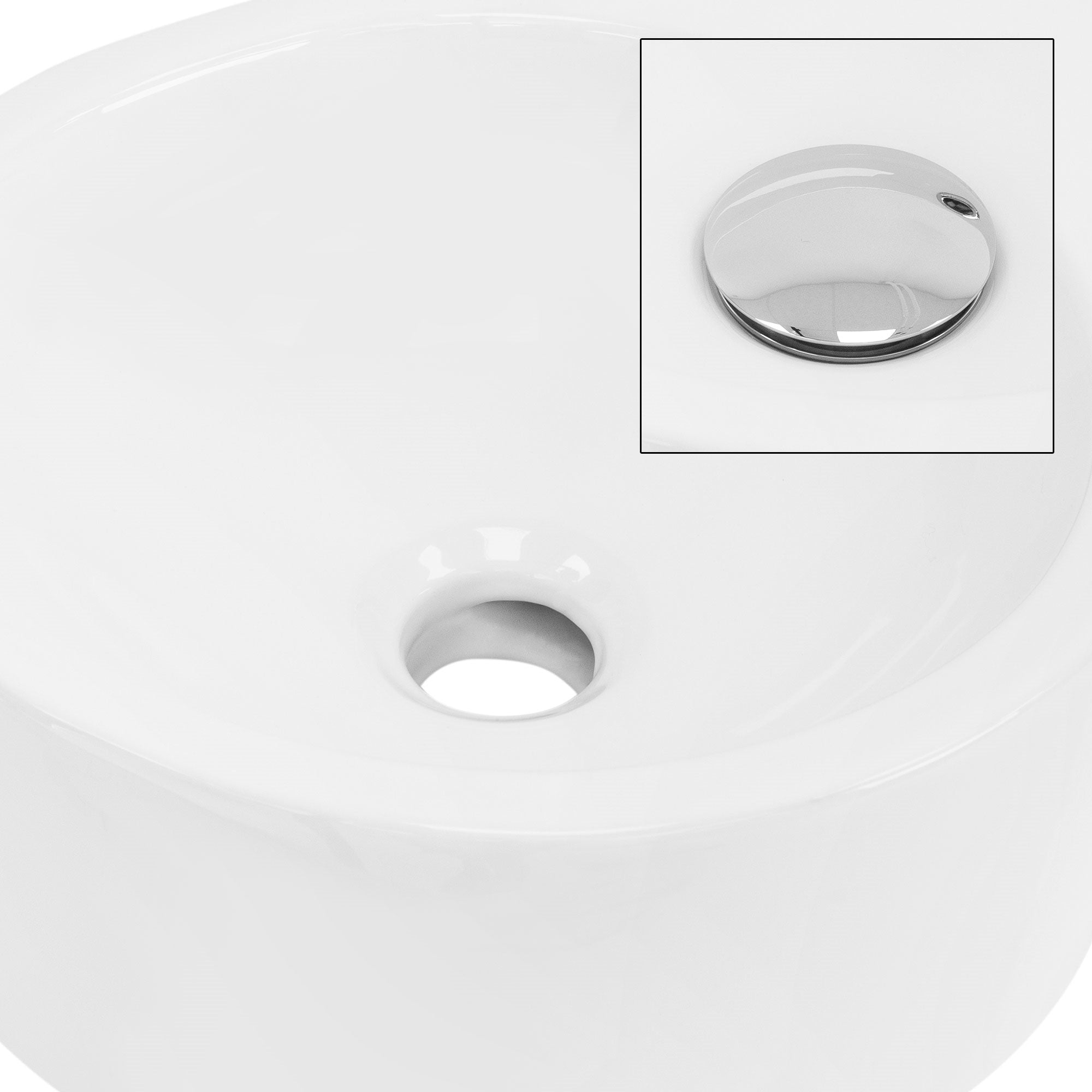 White sink with a round recess and chrome cover.