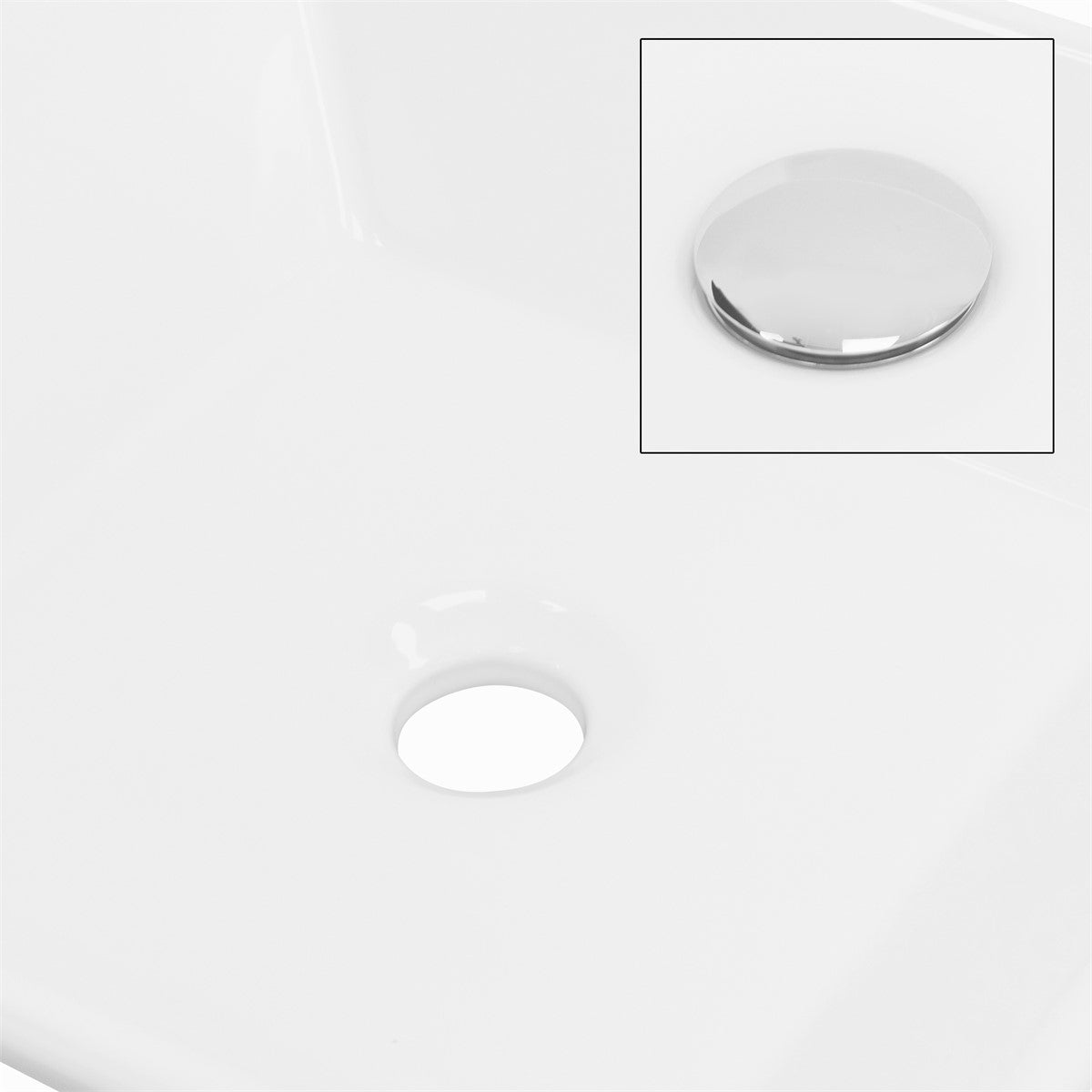 Weißes Waschbecken mit Abflussloch und glänzendem Überlaufdeckel.