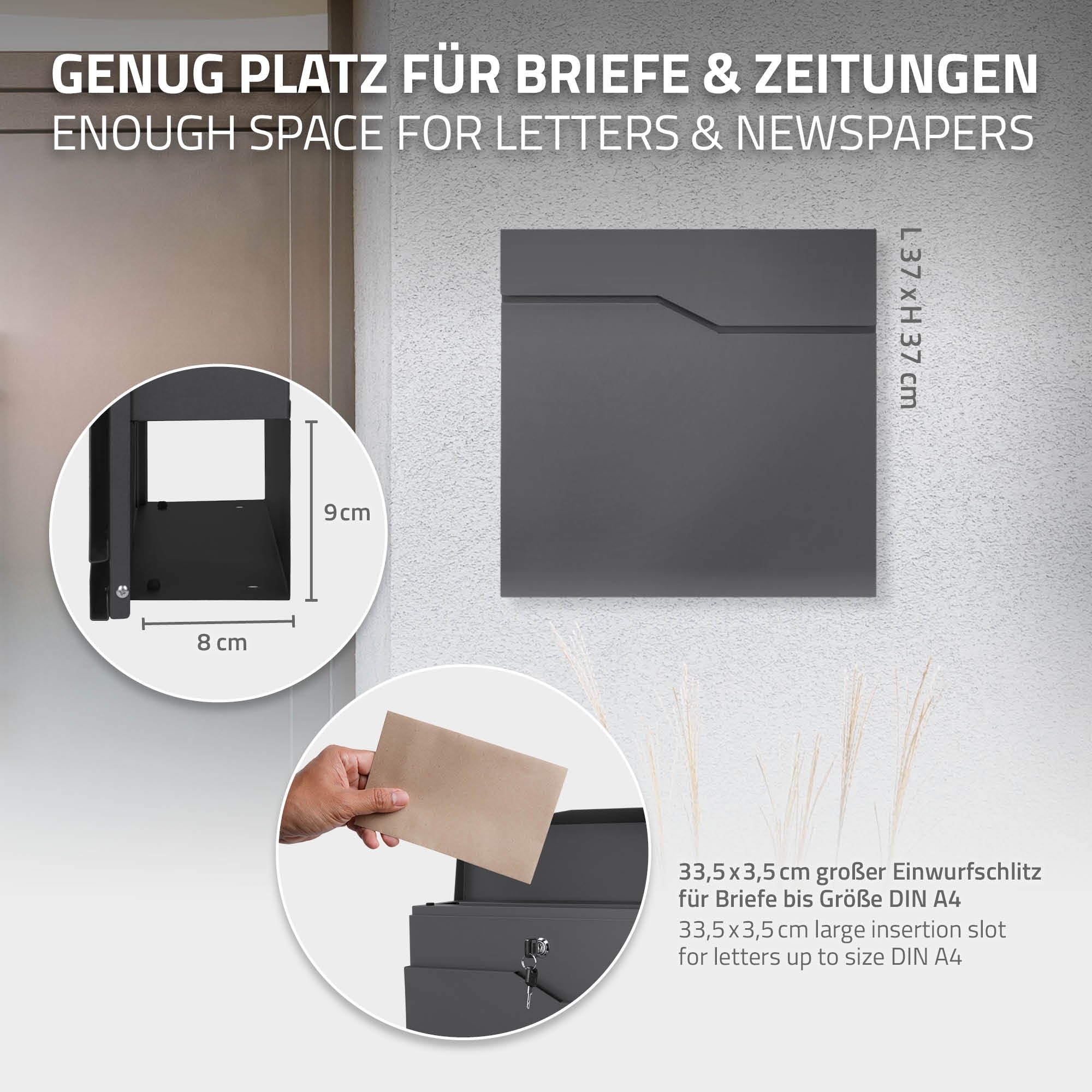 Graue Briefkasten mit Einwurfslot für Briefe und Zeitungen.