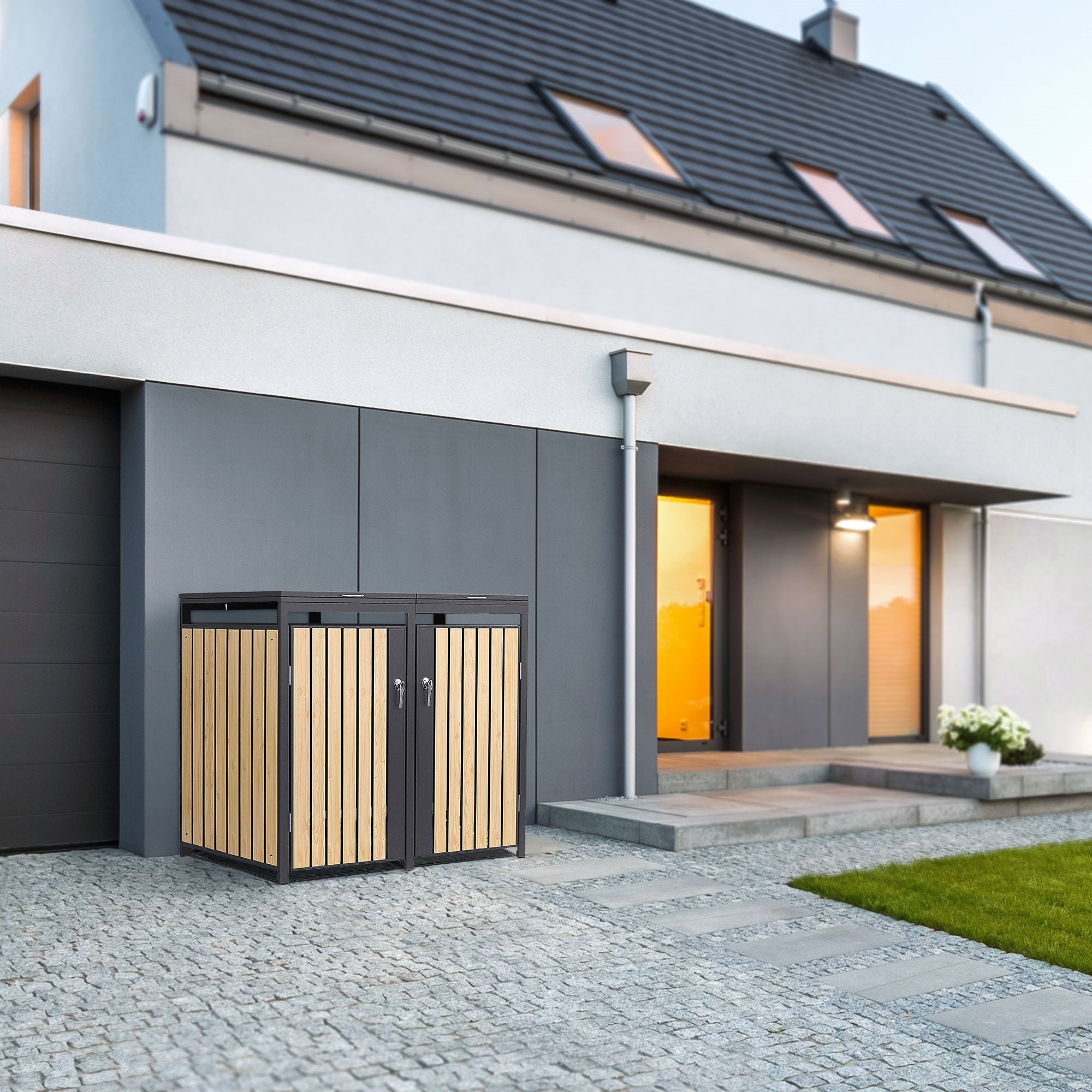 Due contenitori per rifiuti in legno e metallo si trovano davanti a una casa moderna.