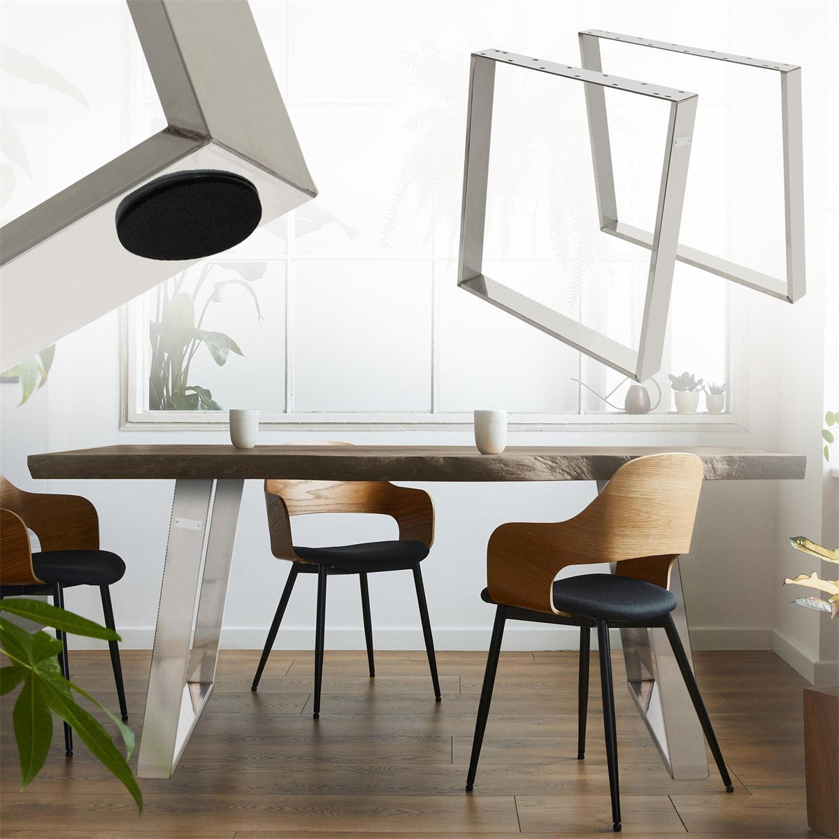 Dining room with a large table and chairs, plants in the background.