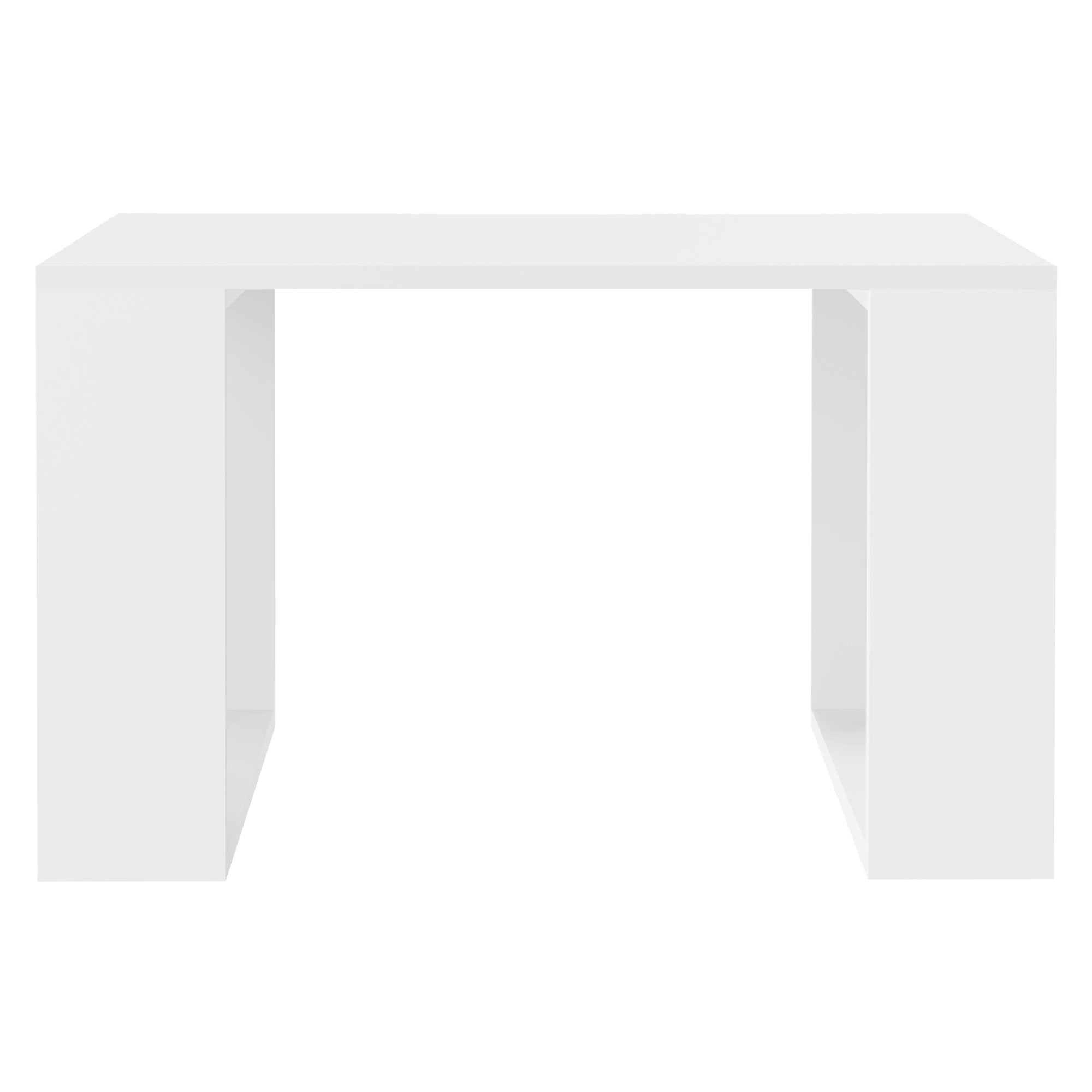 Rektangulært, hvidt bord med åbne bordben, enkelt design.