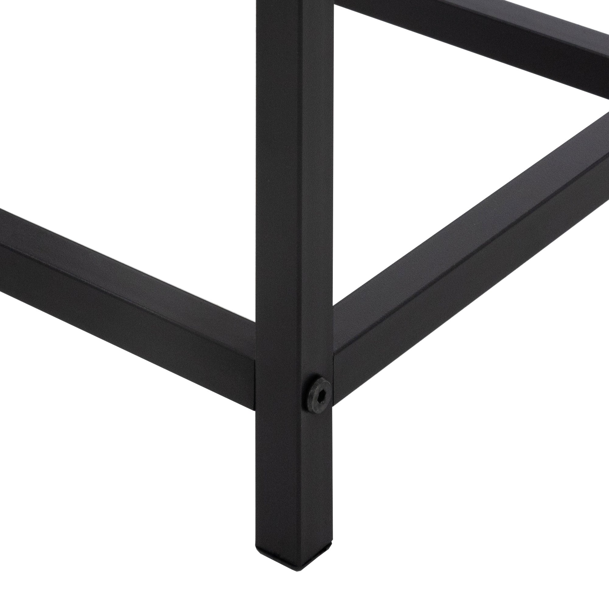 Close-up of a black metal frame with a square base.