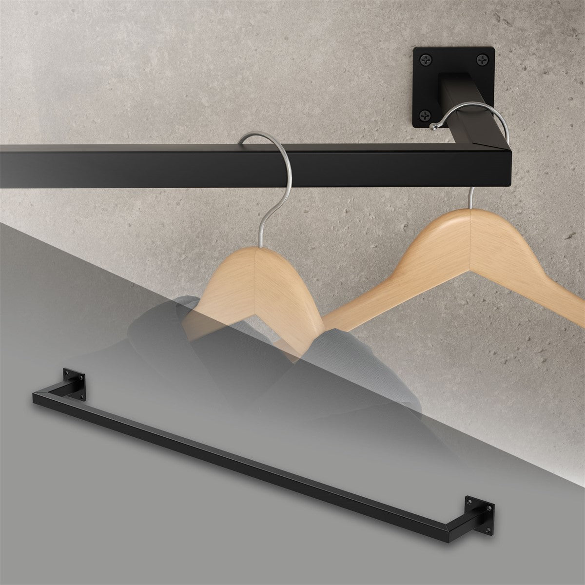 Black clothes hanger with a wooden hanger hook on a wall, partially blurred.