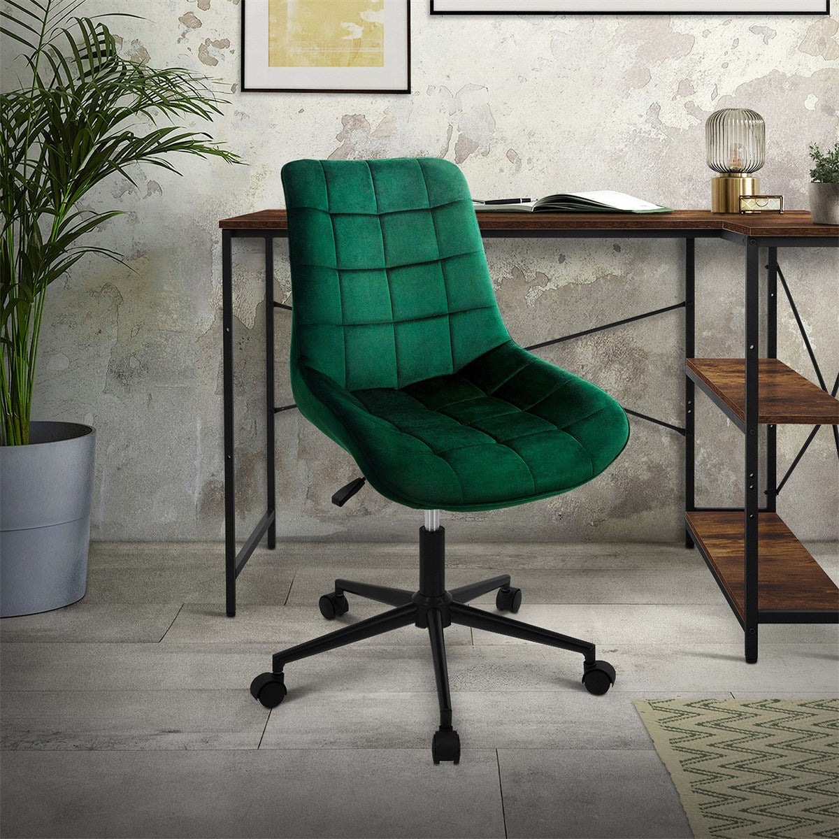 Green upholstered office chair with casters in front of a desk.