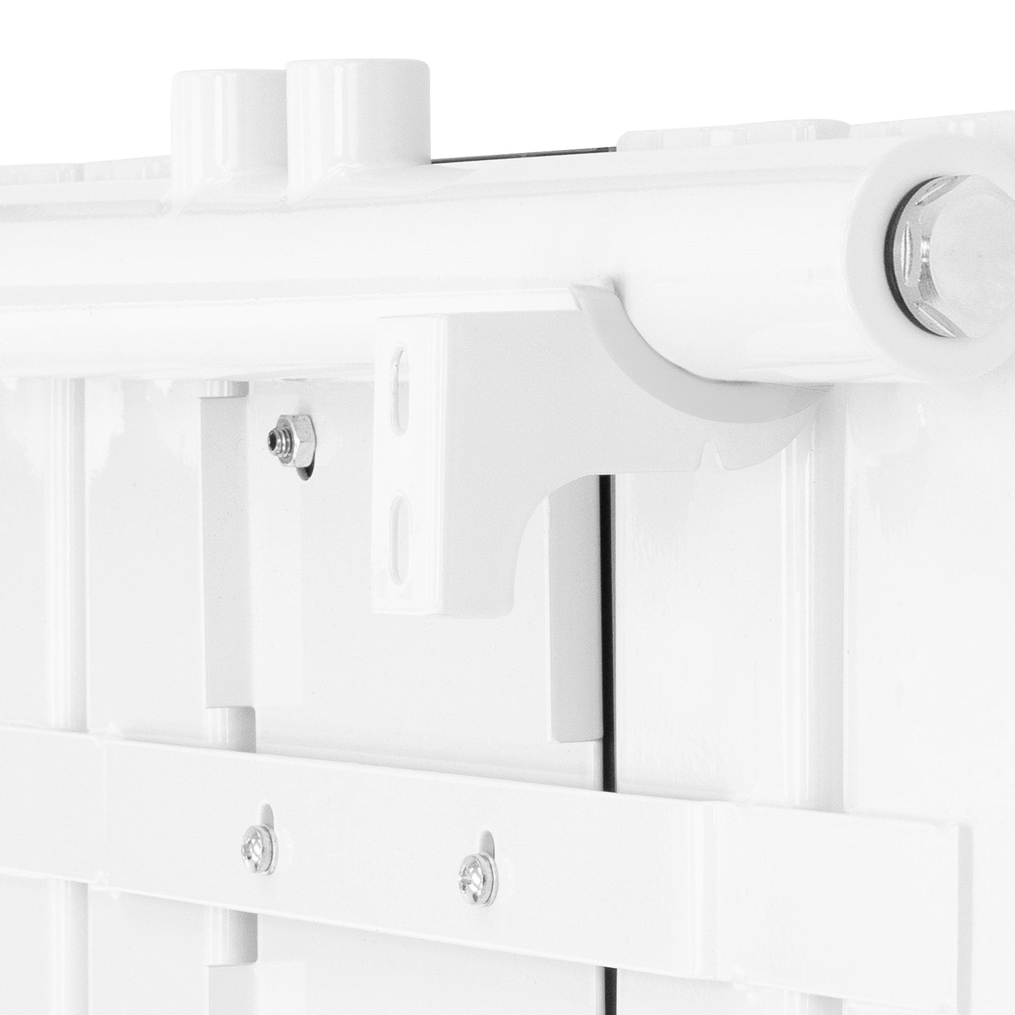 Close-up of a white radiator with bracket.