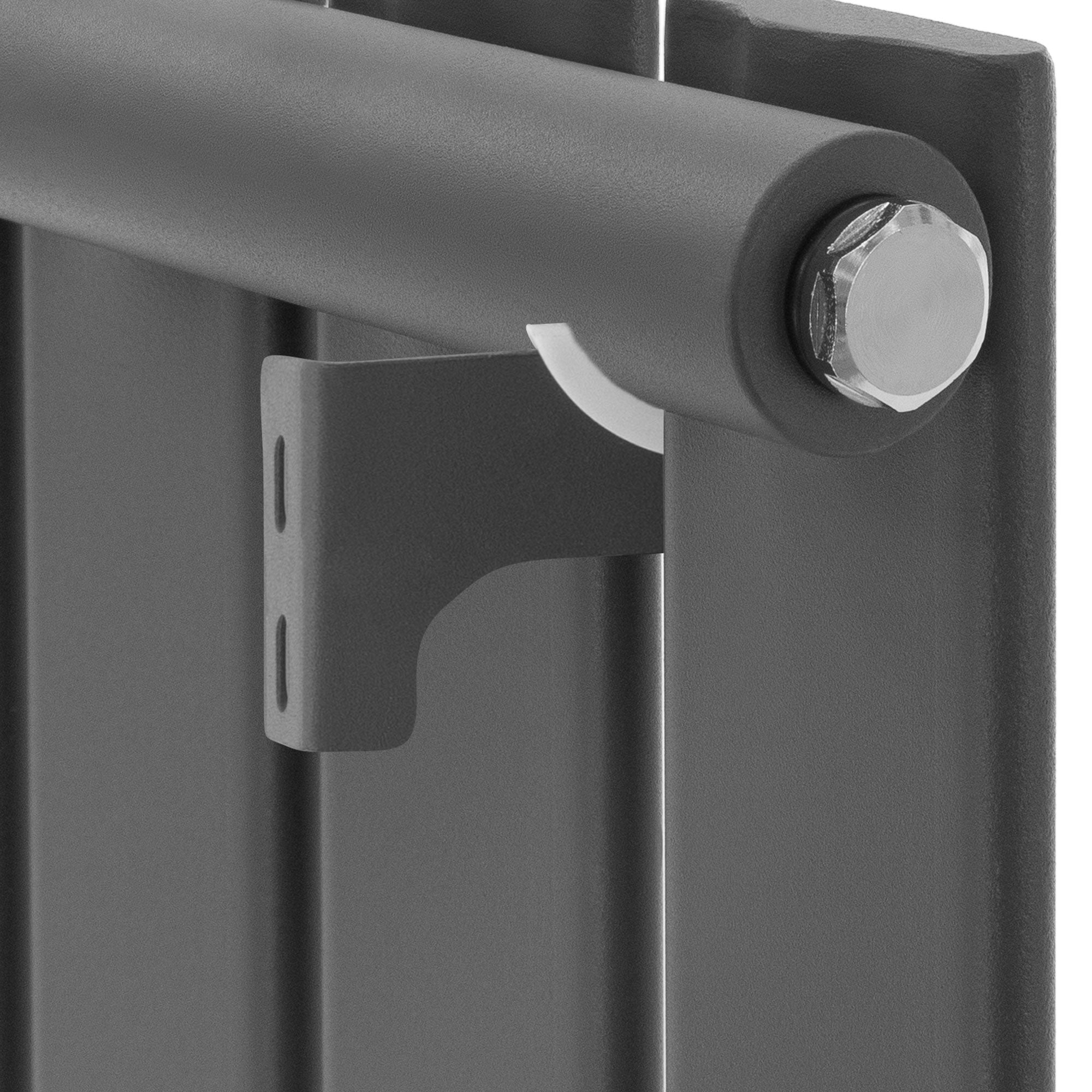 Close-up of a dark gray heating panel with bracket.