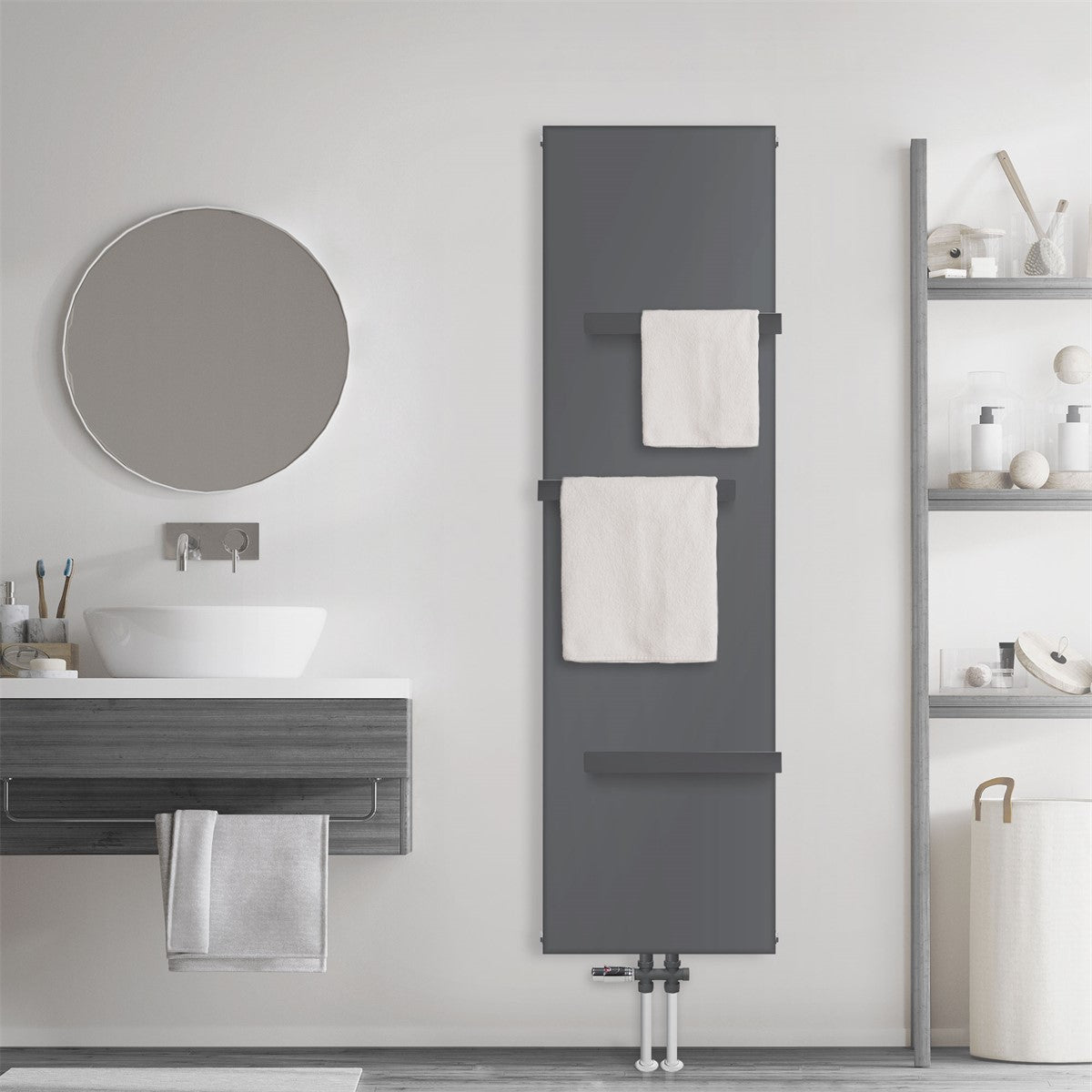 Anthracite-colored radiator with two towels in the bathroom.