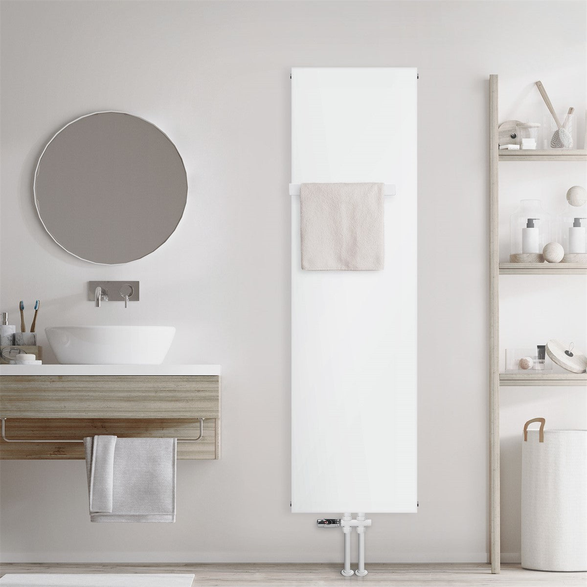 White radiator on a wall with a towel and a mirror.