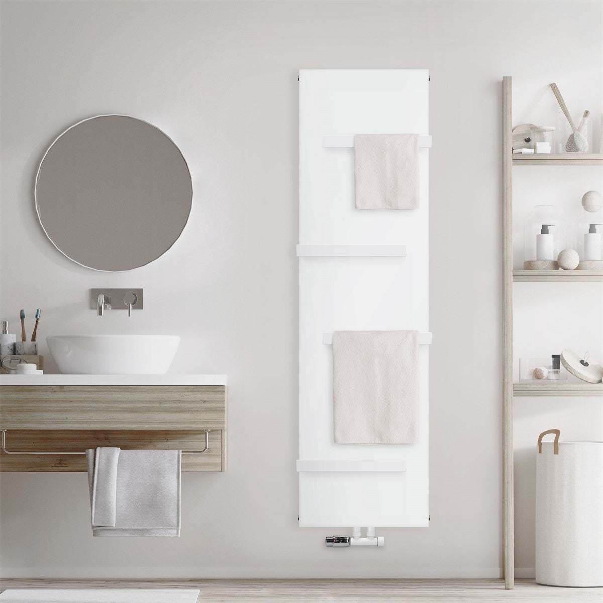 White radiator with two towels on a wall.