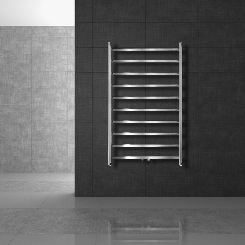 A silver towel radiator on a dark wall.