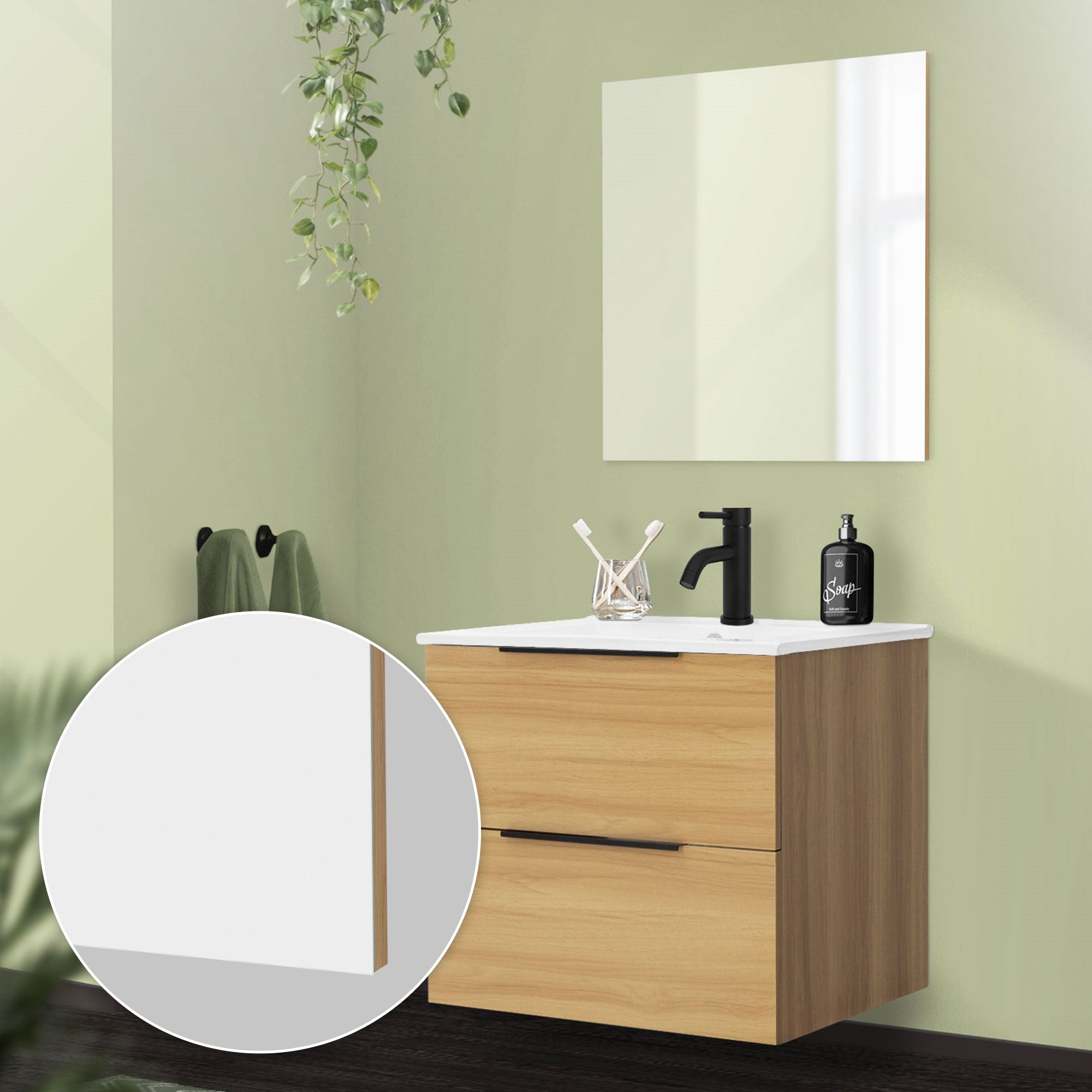 Bathroom view with cabinet, washbasin, and mirror on green wall.