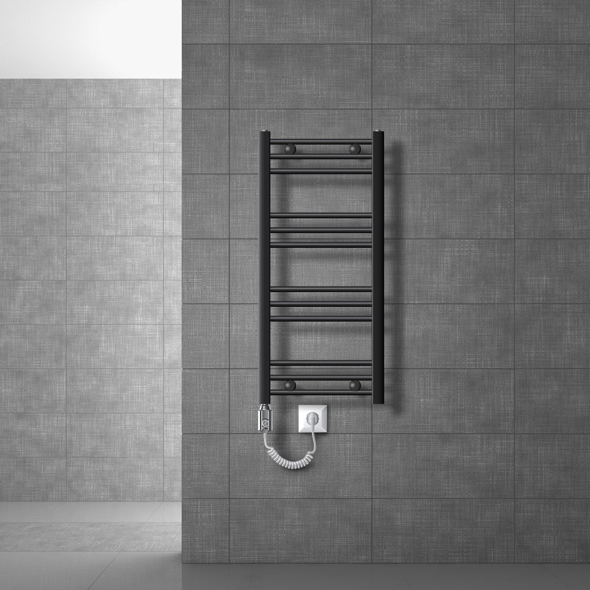 Compact anthracite towel radiator with an electrical connection on a grey wall.