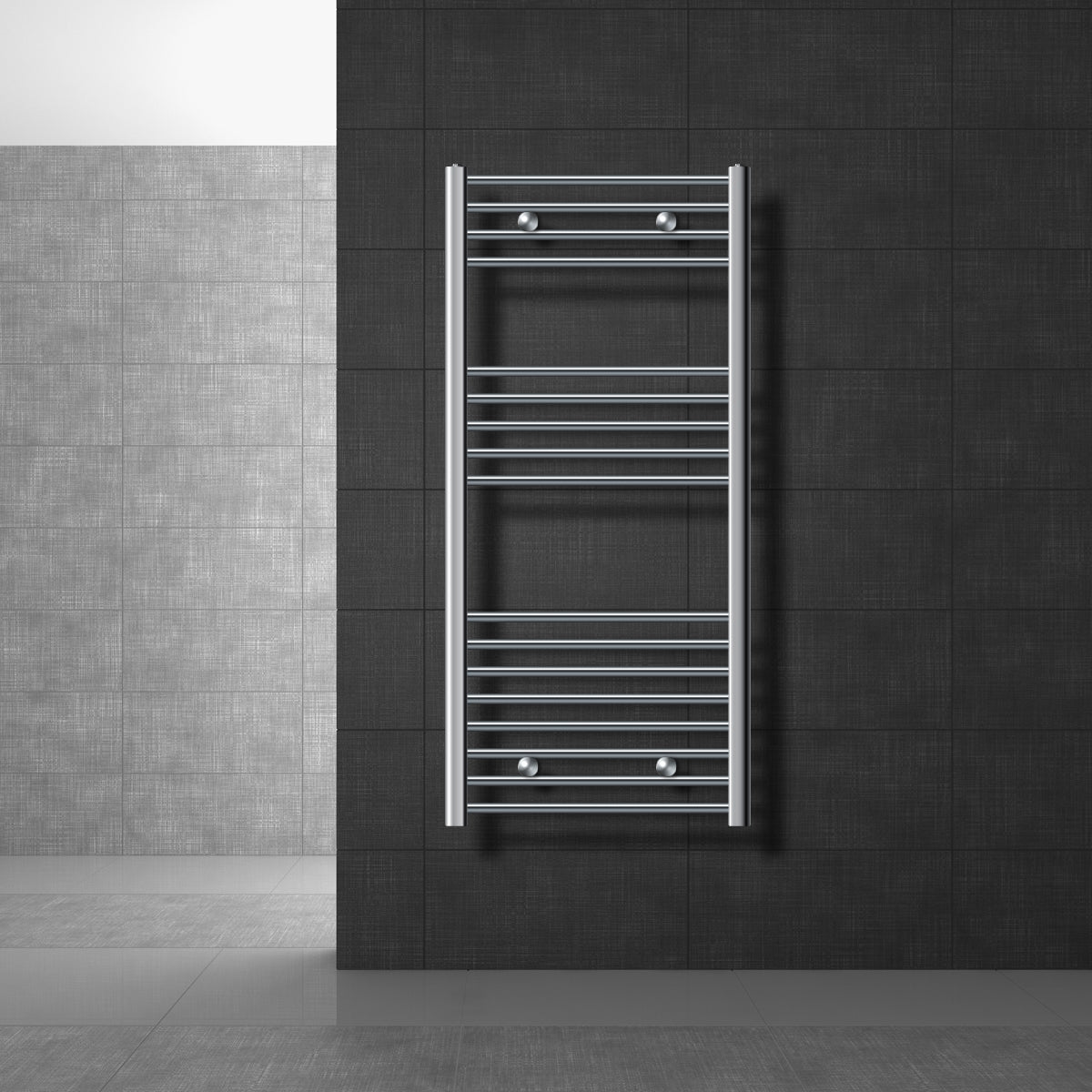 A chrome towel warmer on a dark wall.