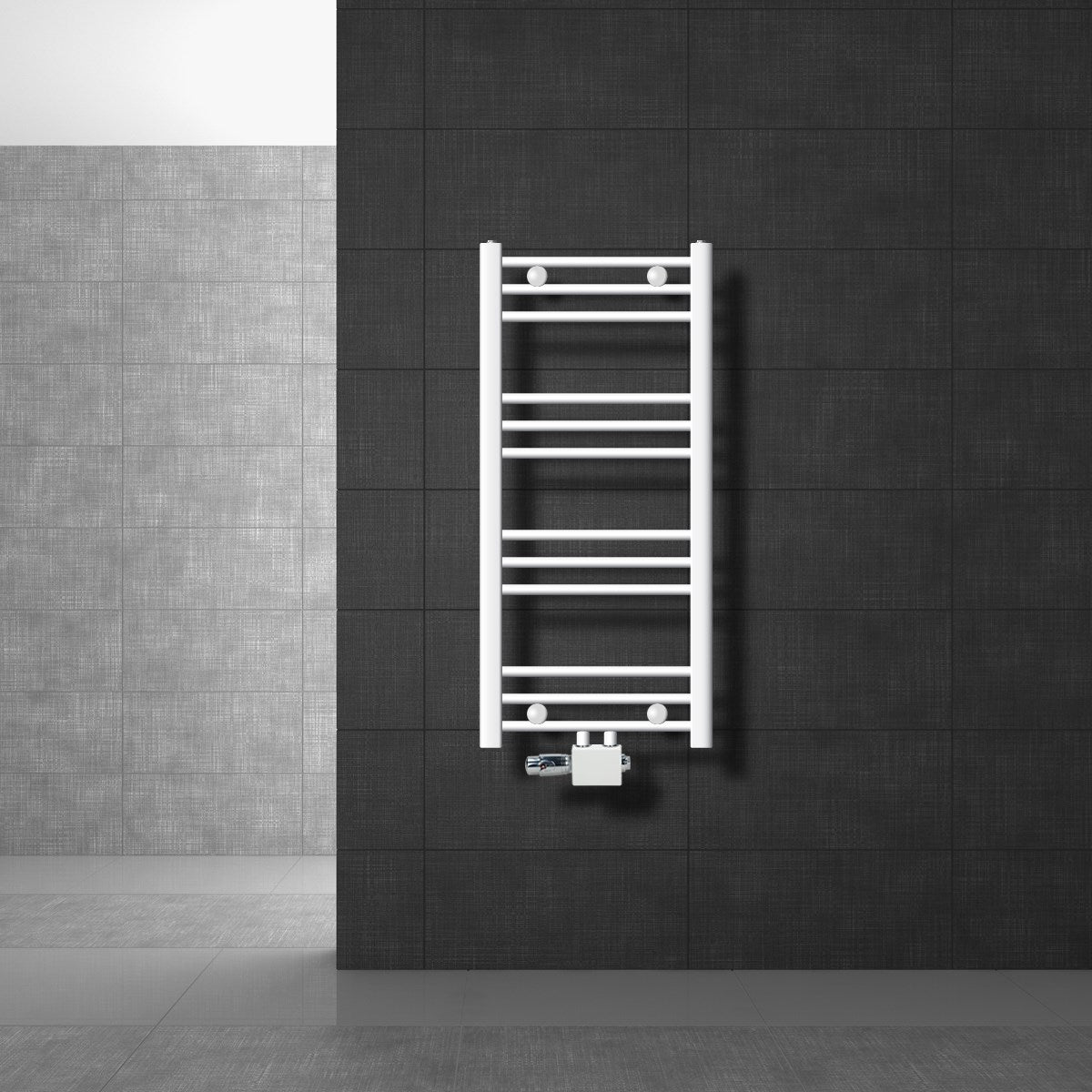 White radiator on a dark wall, with two connection points.