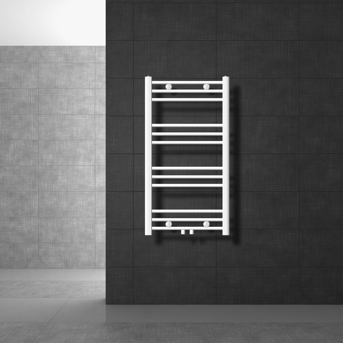Hvid radiator på en mørk væg i et moderne rum.