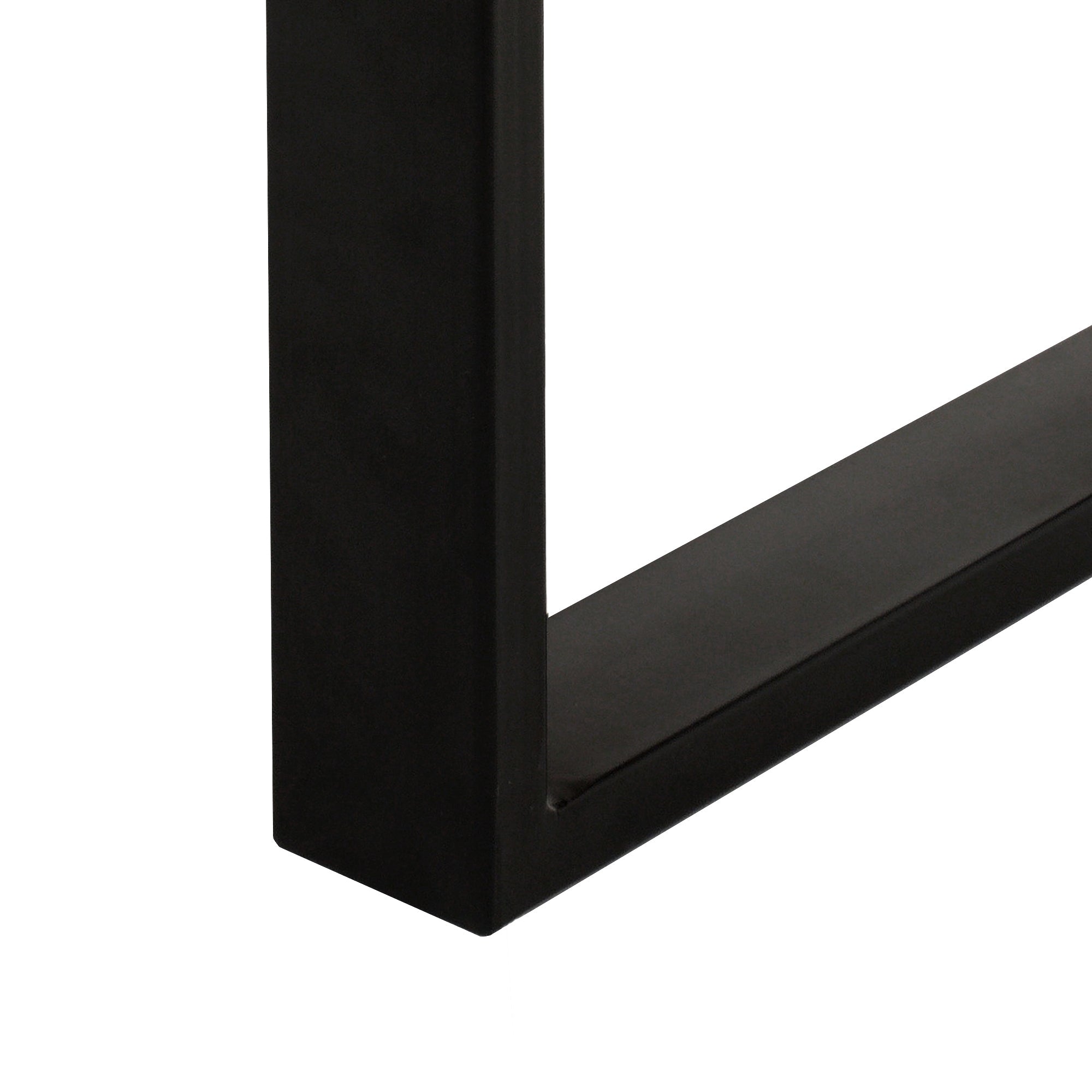 Close-up of a black metal frame with a flat bottom.
