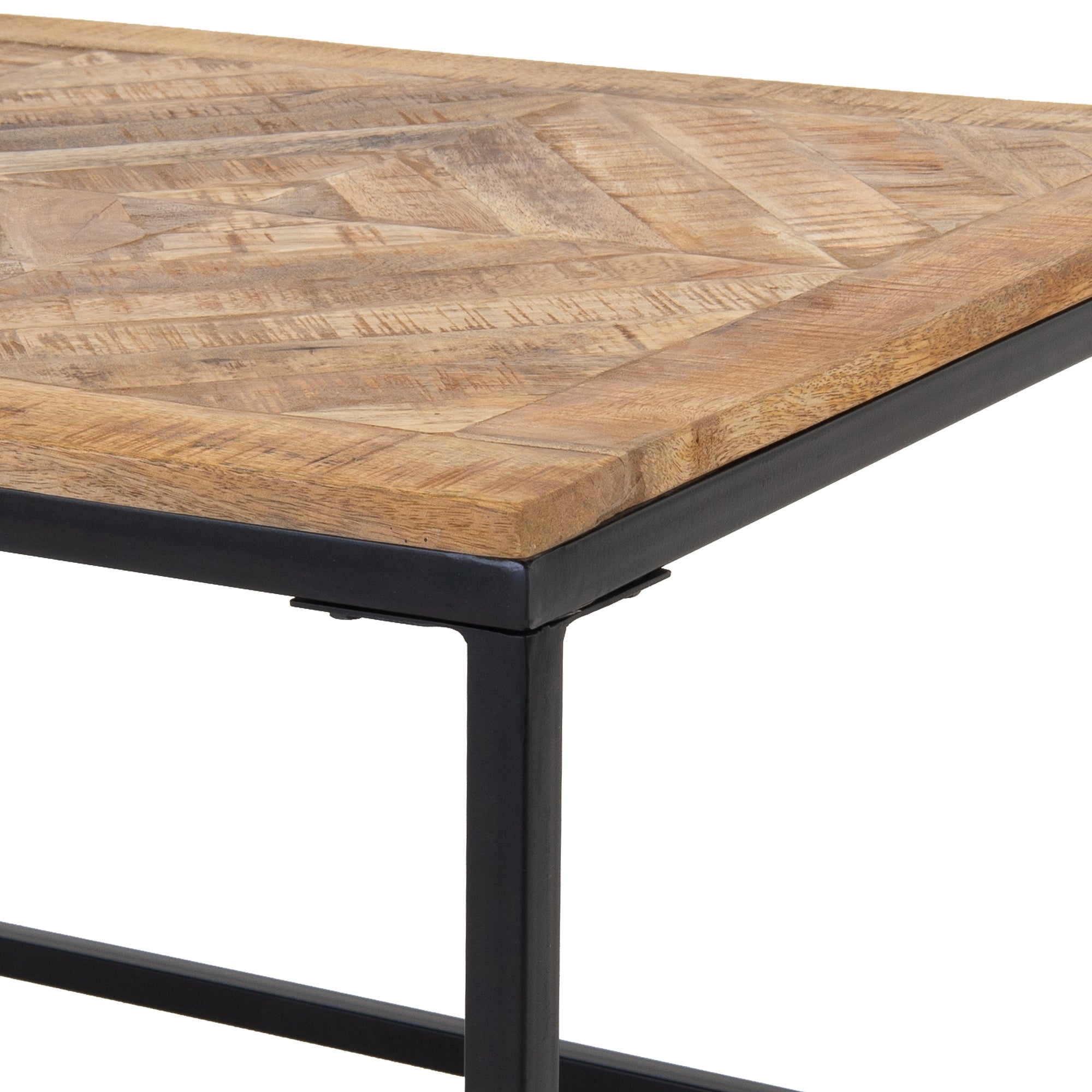 Tabletop made of light wood with geometric pattern.