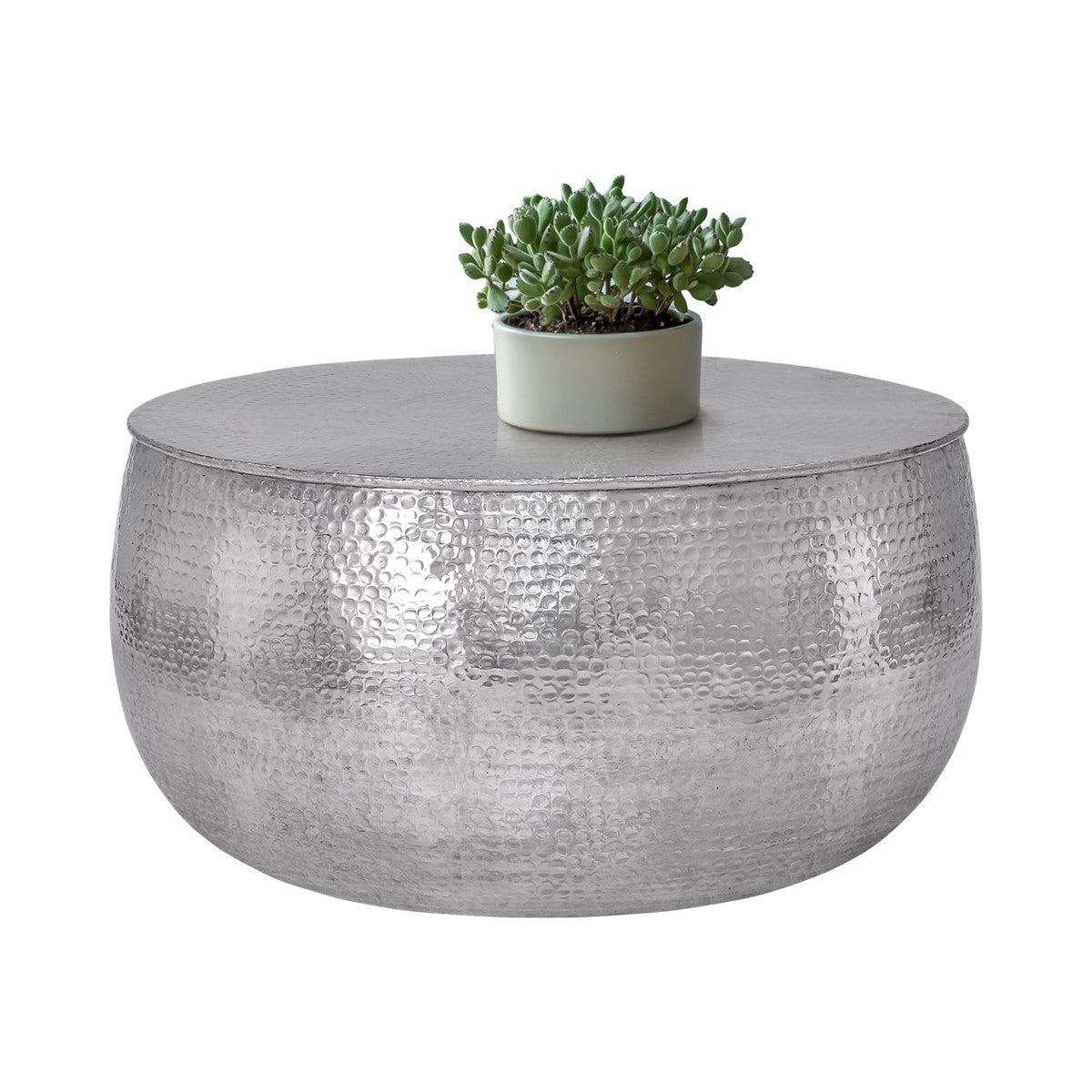 Round silver-coloured table with a plant on the tabletop.