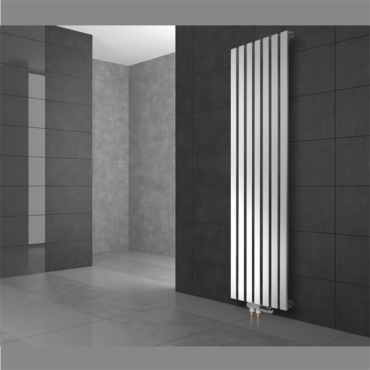 Een witte radiator aan een grijze muur in een moderne ruimte.