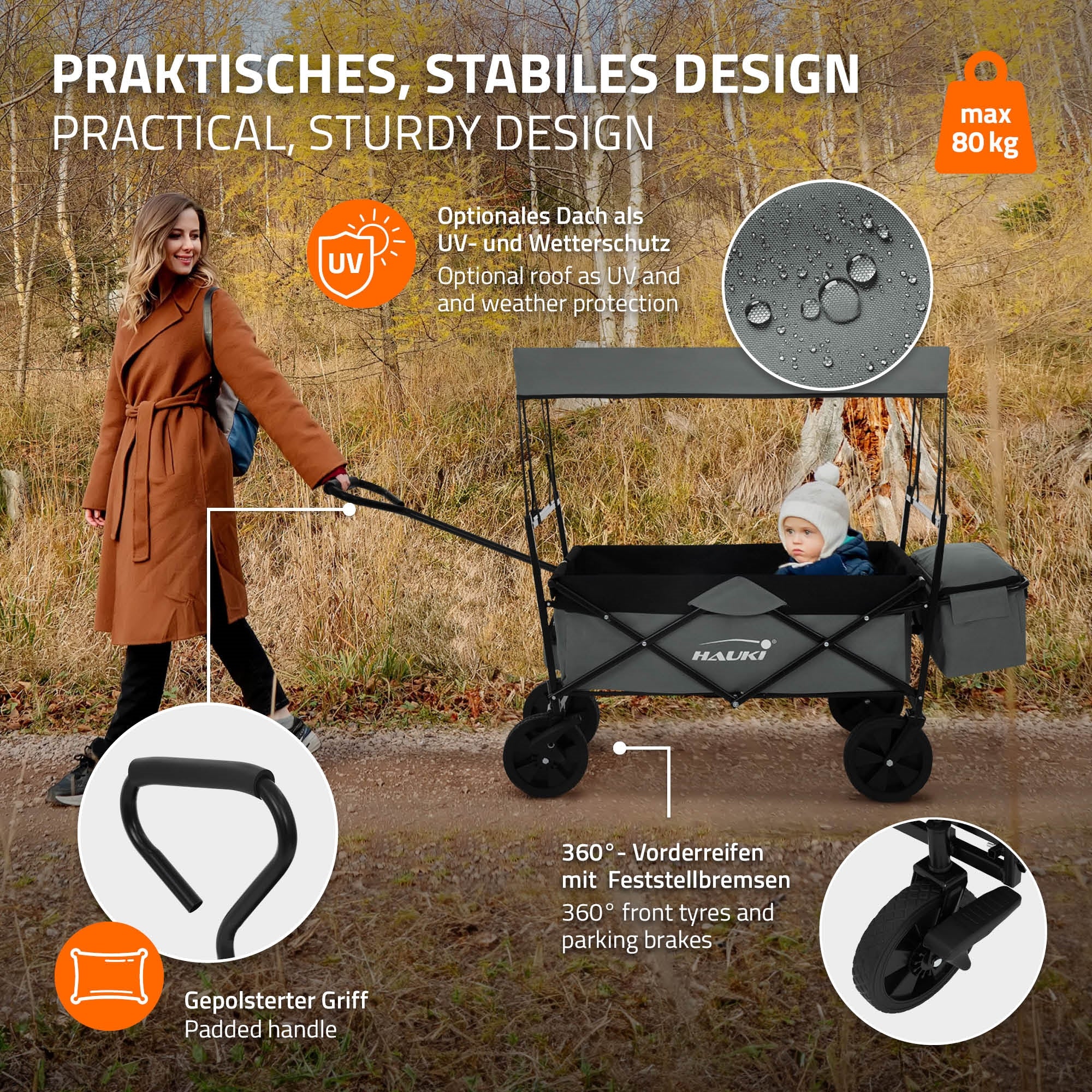 Ein stabiler Kinderwagen mit Sonnenschutz und großen Rädern auf einem Weg.