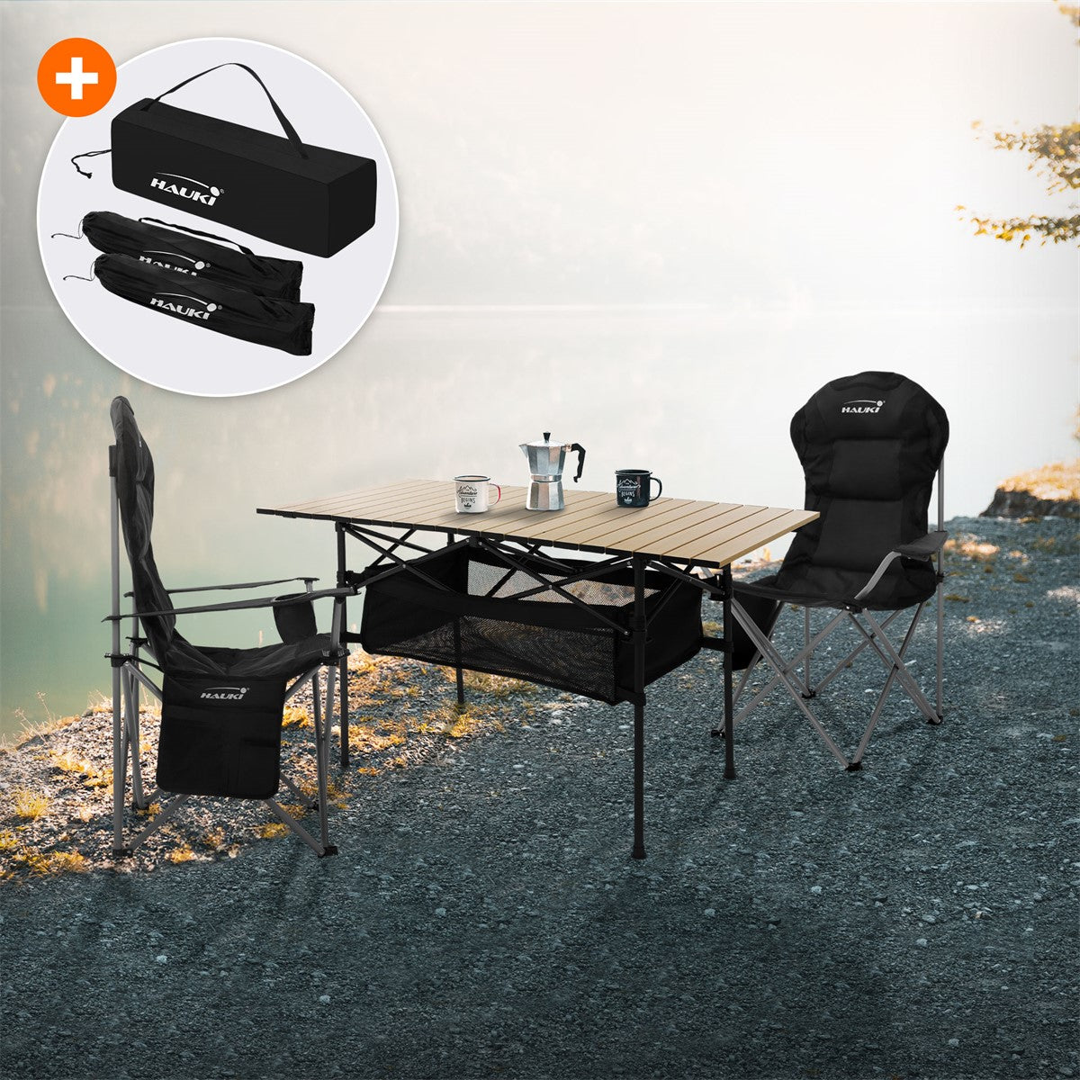 Camping table and two chairs by the water with cups and a coffee pot.