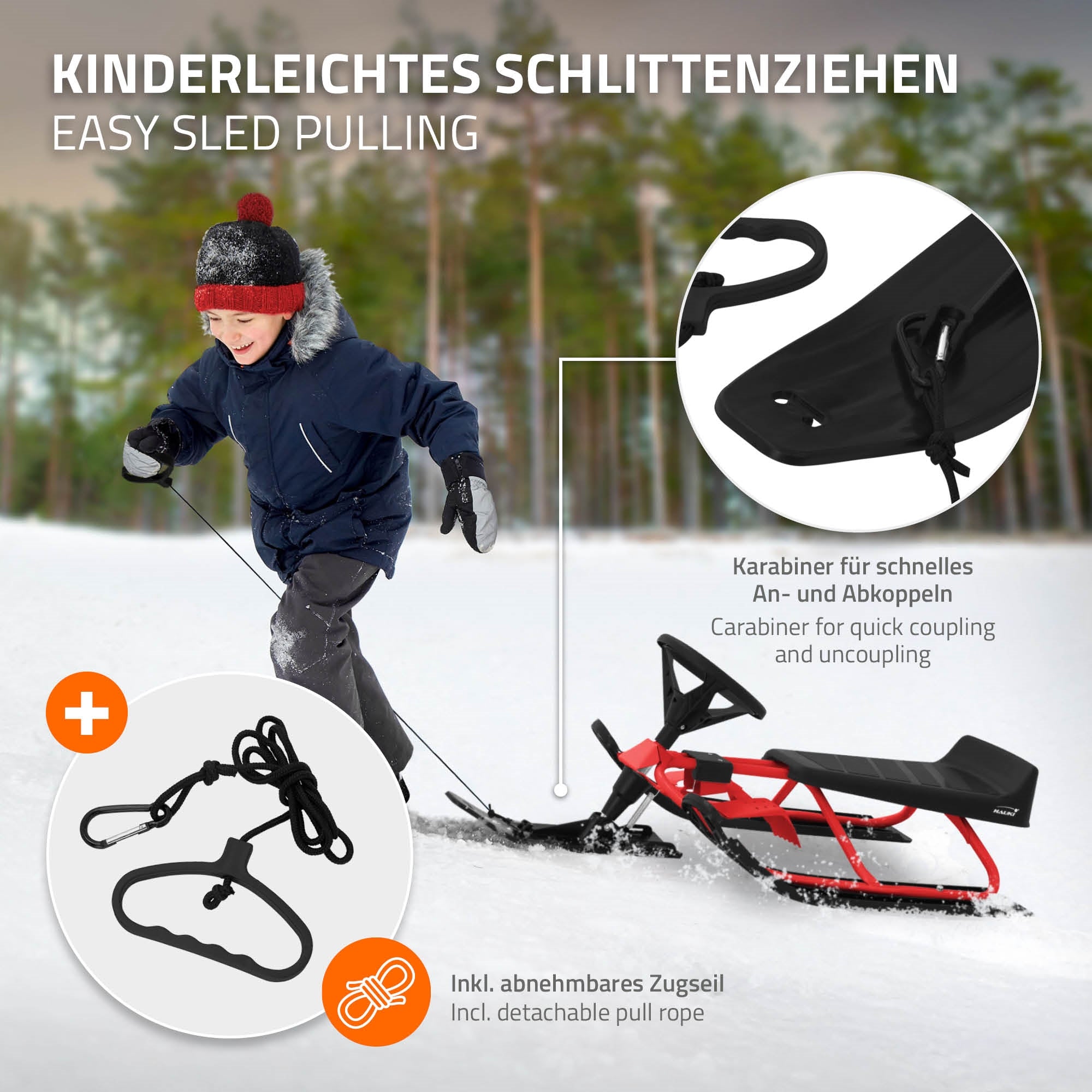 Boy pulling a sled on snow, with a carabiner and detachable tow rope.