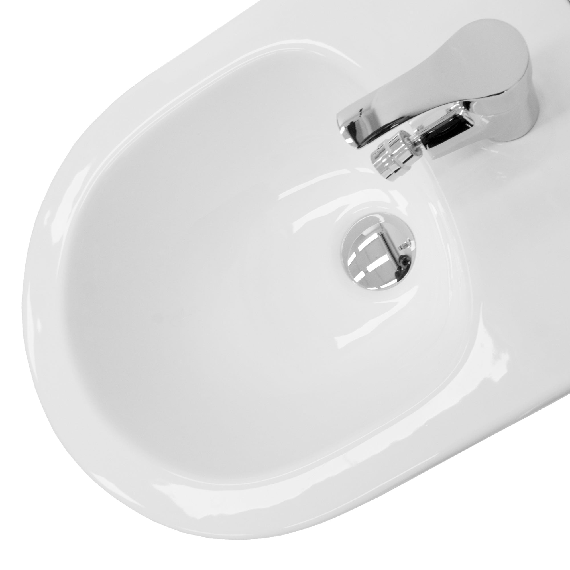 White sink with a faucet.