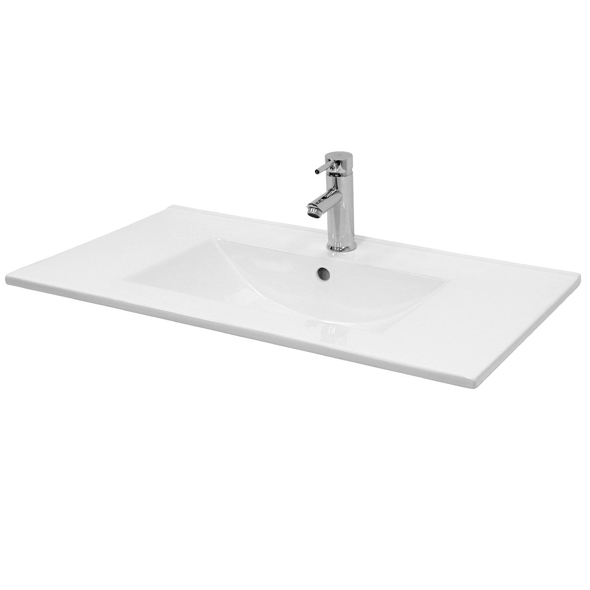 Un lavabo blanc avec un robinet sur le côté droit.