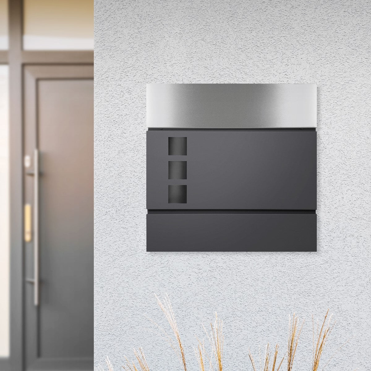 Mailbox mounted on a wall, modern and simple.