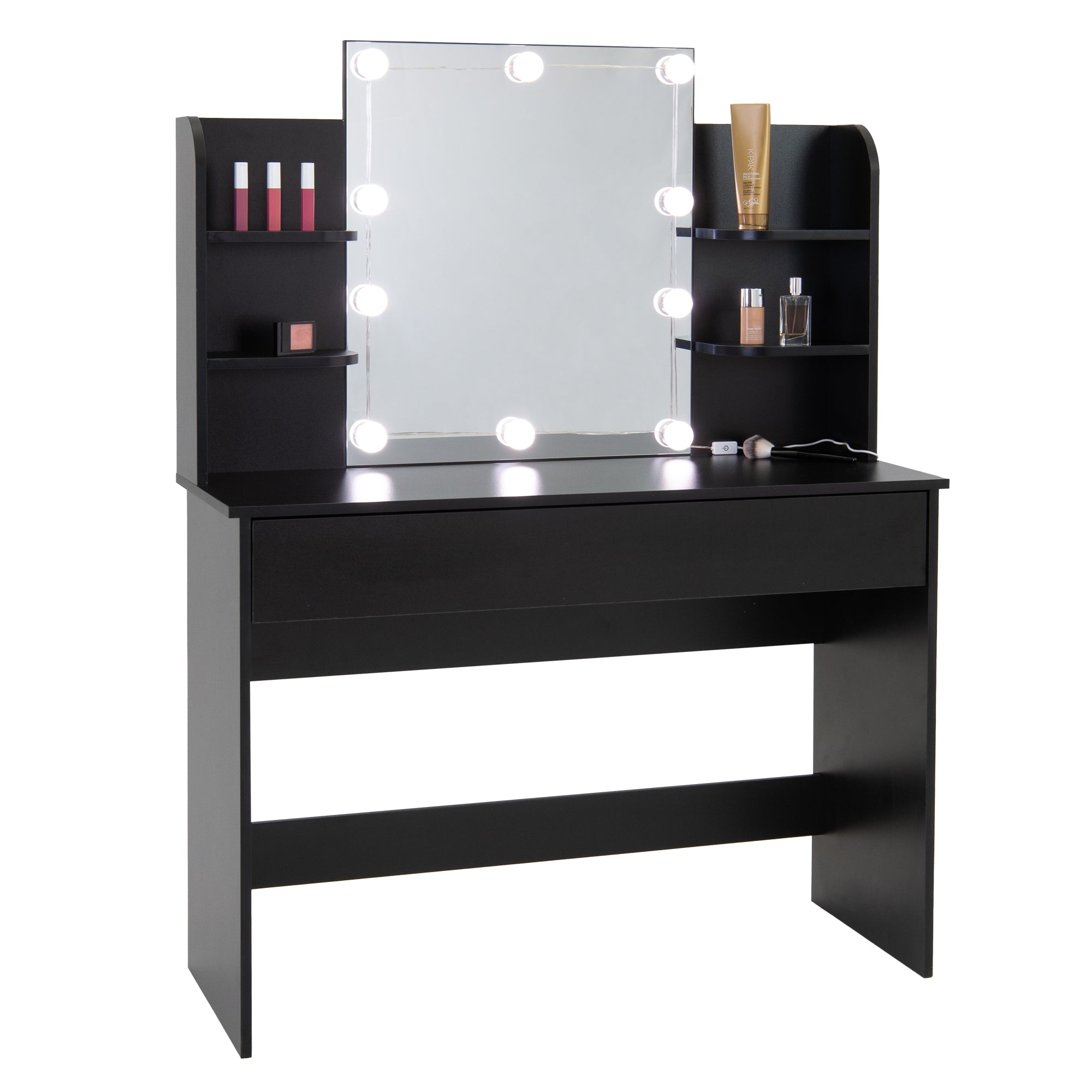 Black makeup table with illuminated mirror and cosmetic products.