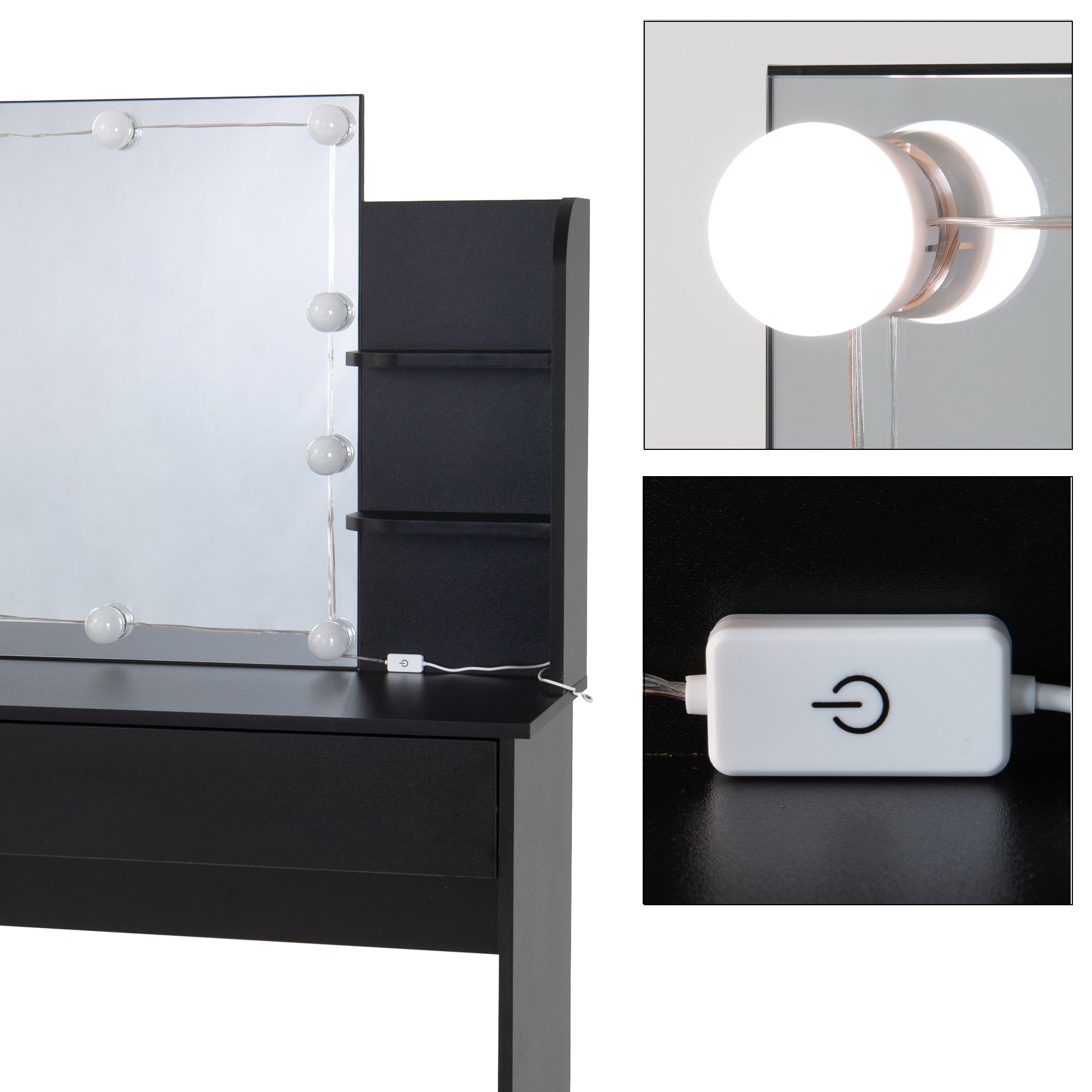 Black makeup table with illuminated mirror and switch.
