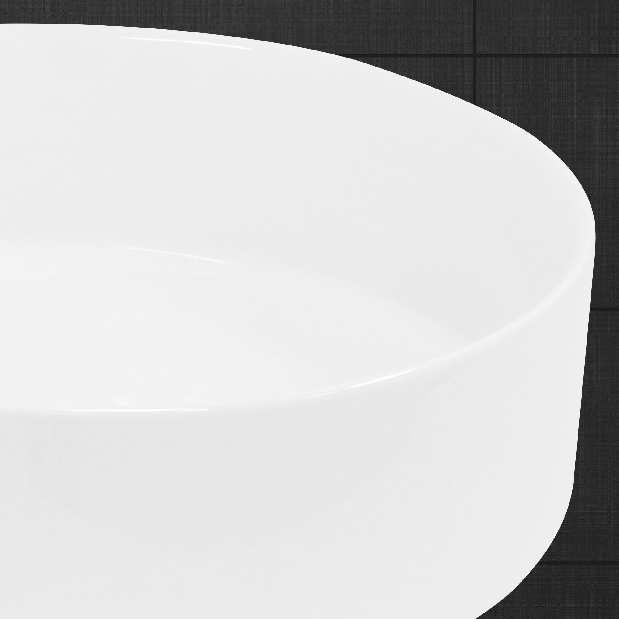 Close-up of the edge of a white washbasin.