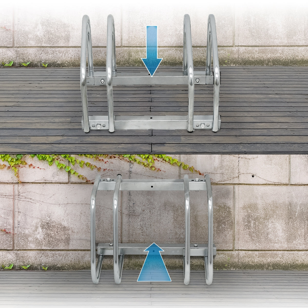 Een fietsenrek van metaal met twee pijlen die naar beneden wijzen, op een houten ondergrond.