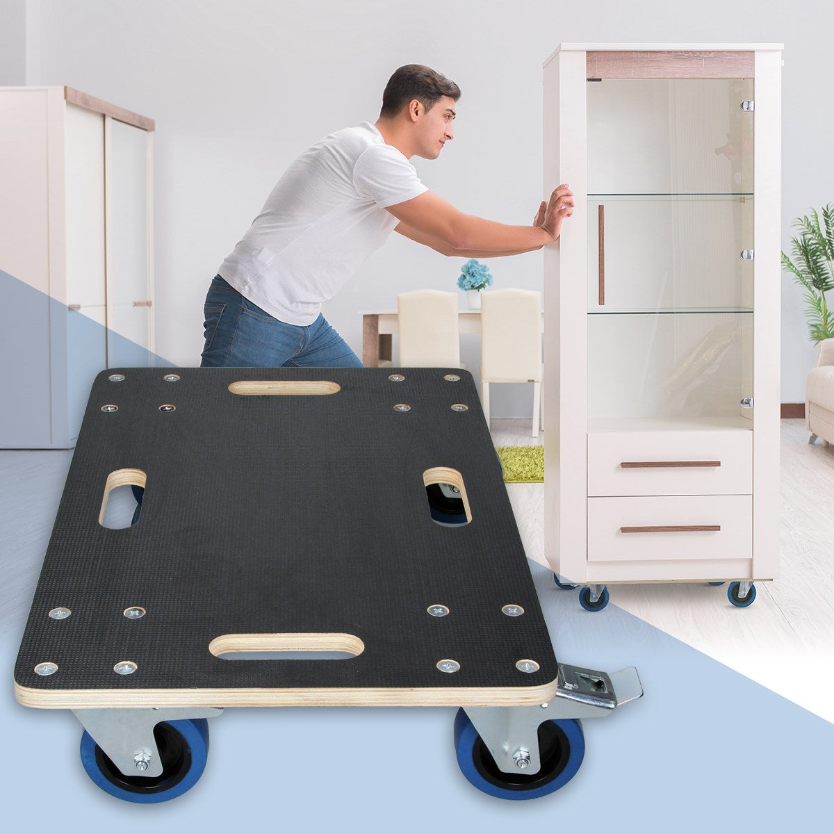Un hombre empuja un carrito para muebles con un armario en una habitación.