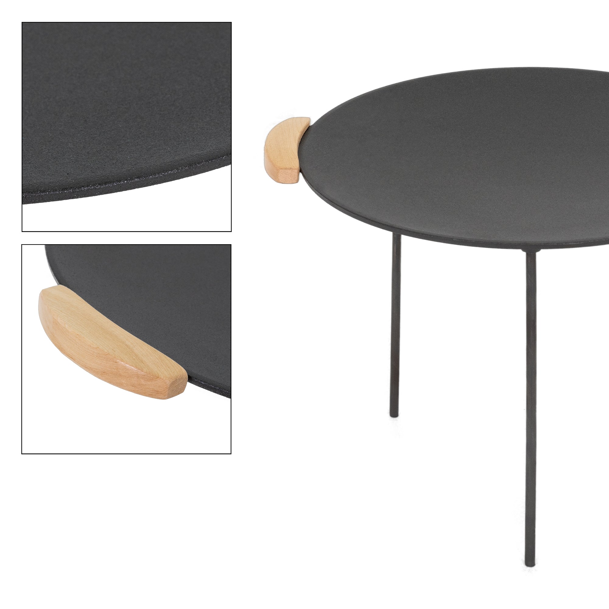 Round table with a black surface and wooden handle.