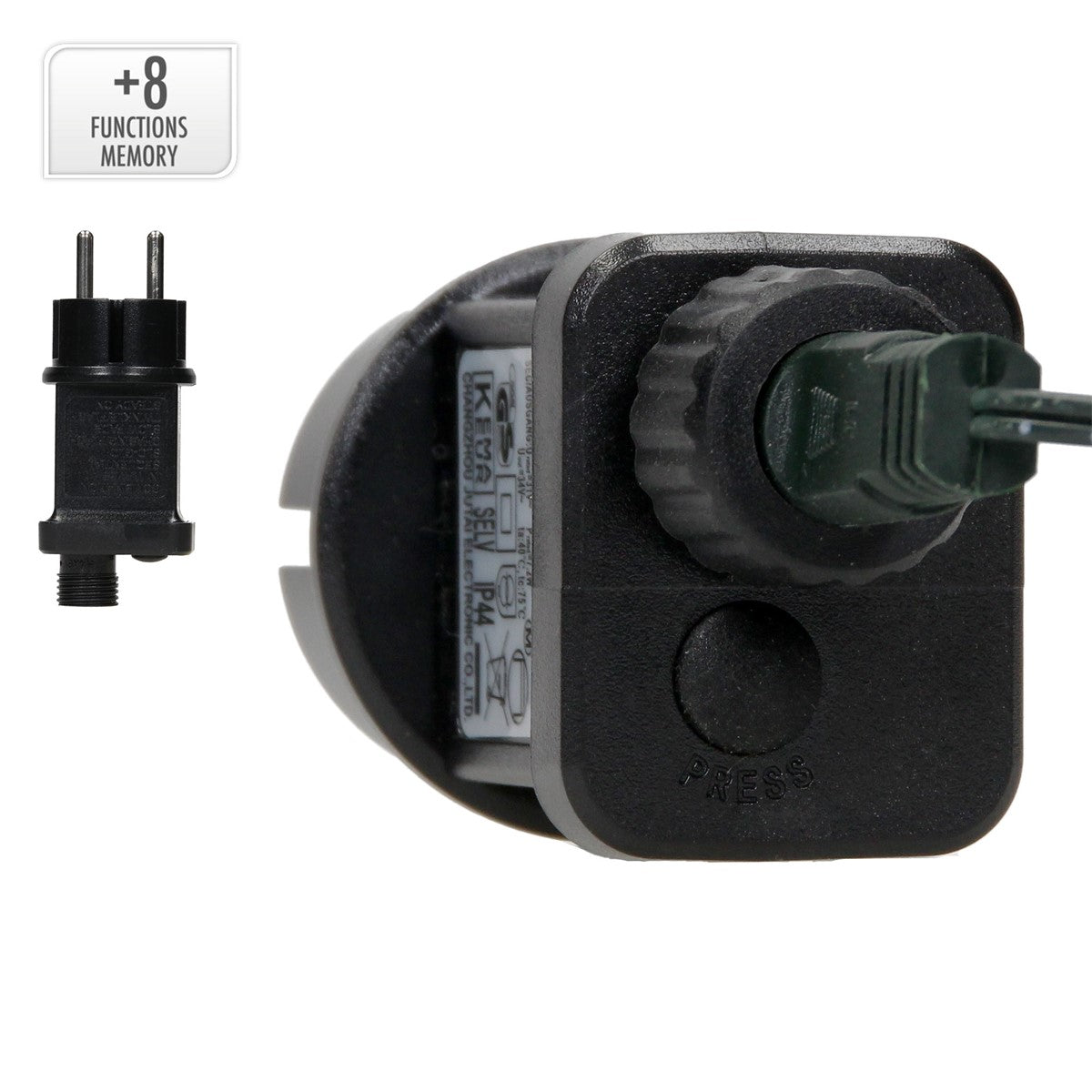Ein schwarzes Gerät mit einem grünen Kabel und einem Stecker, daneben ein kleiner Stecker.